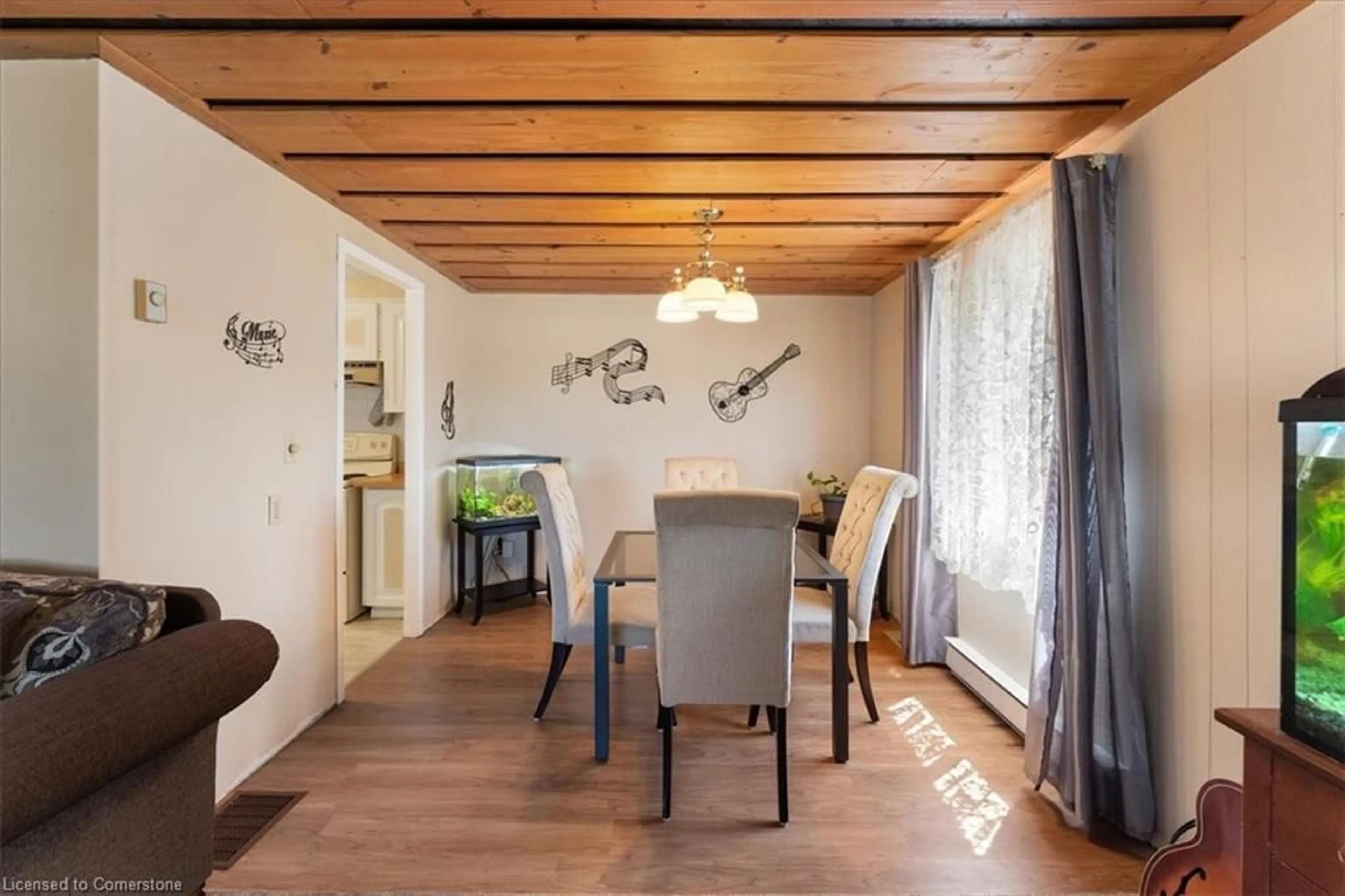 Dining room, wood/laminate floor for 241 St Paul St #241, St. Catharines Ontario L2S 2E5