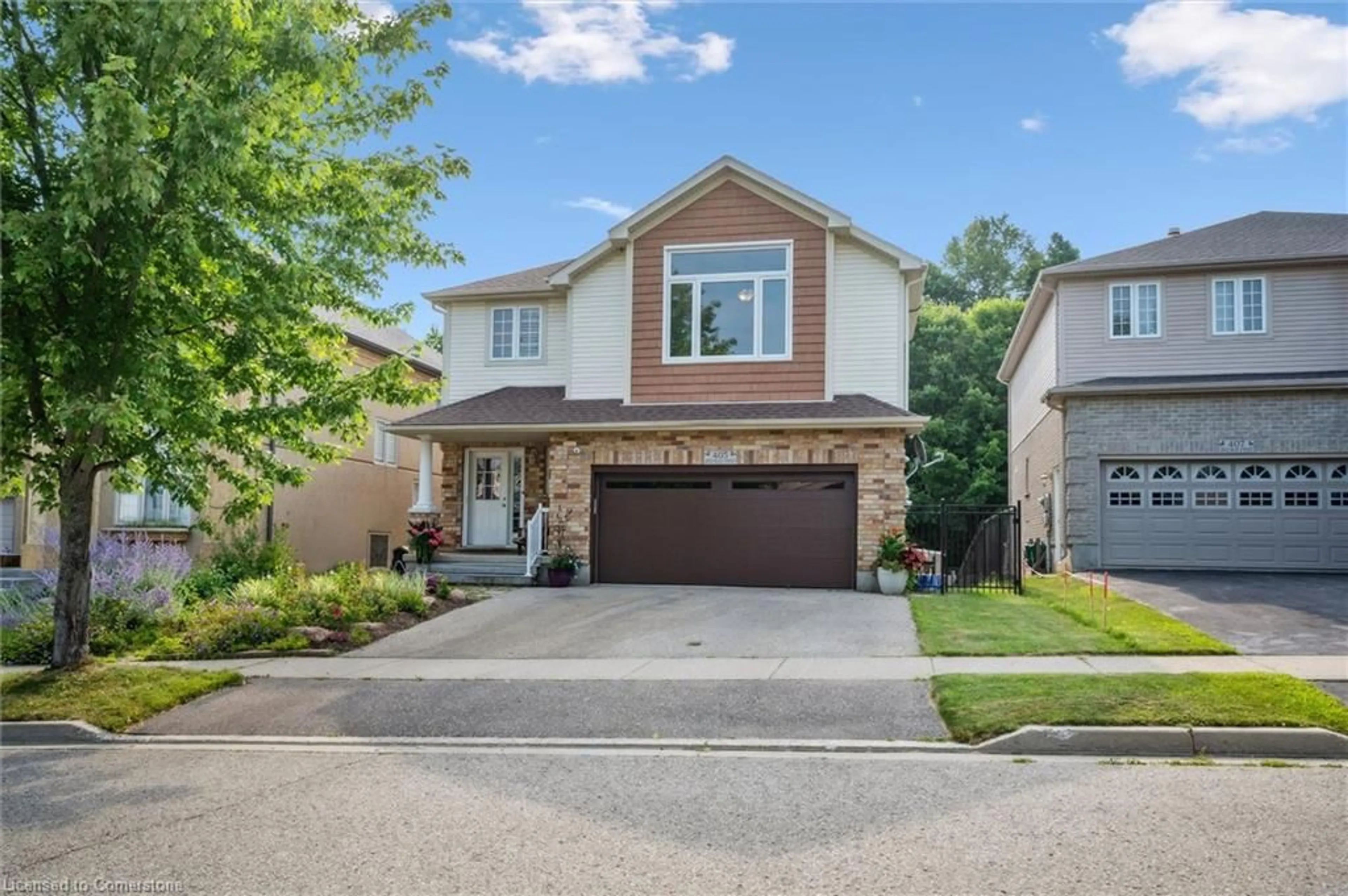 Home with brick exterior material, street for 405 Spice Bush St, Waterloo Ontario N2V 2V6