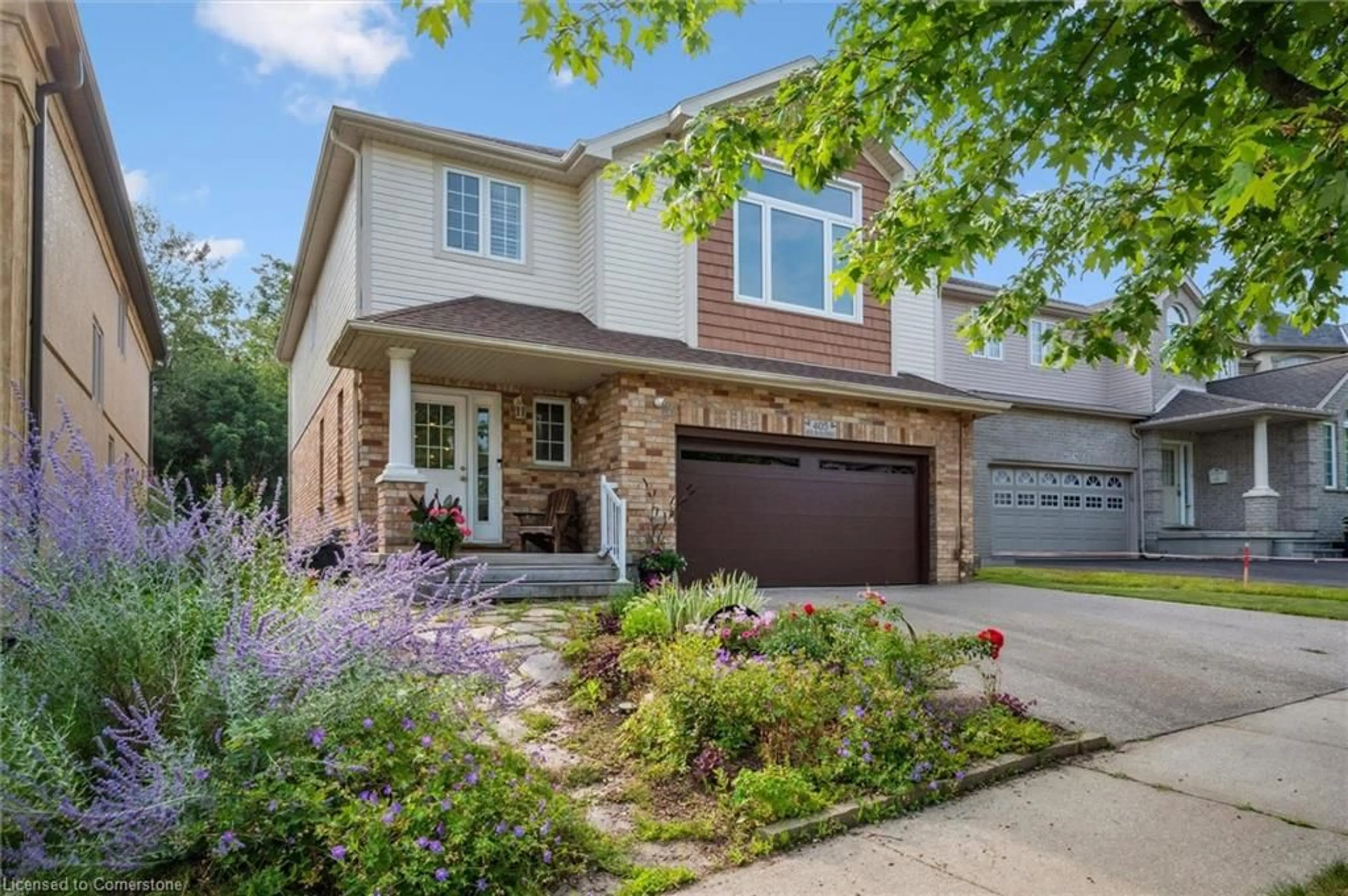 Home with brick exterior material, street for 405 Spice Bush St, Waterloo Ontario N2V 2V6