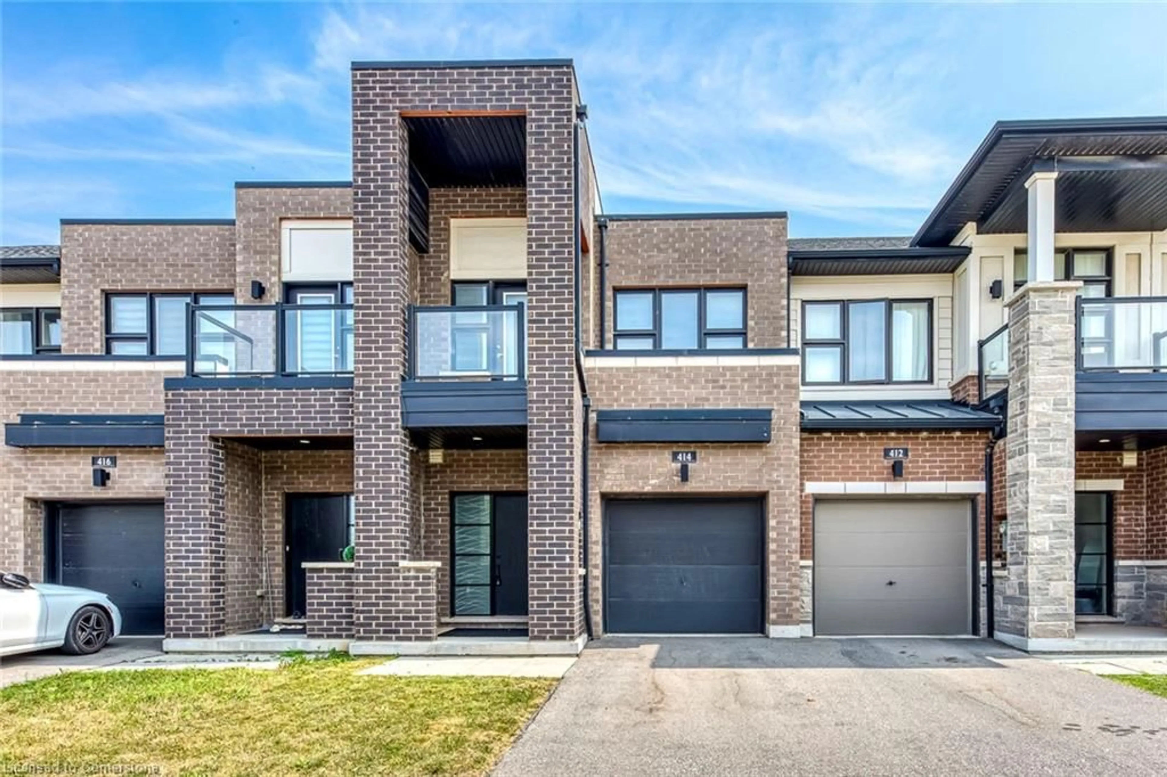 Home with brick exterior material, street for 414 Wheat Boom Dr, Oakville Ontario L6H 0R4