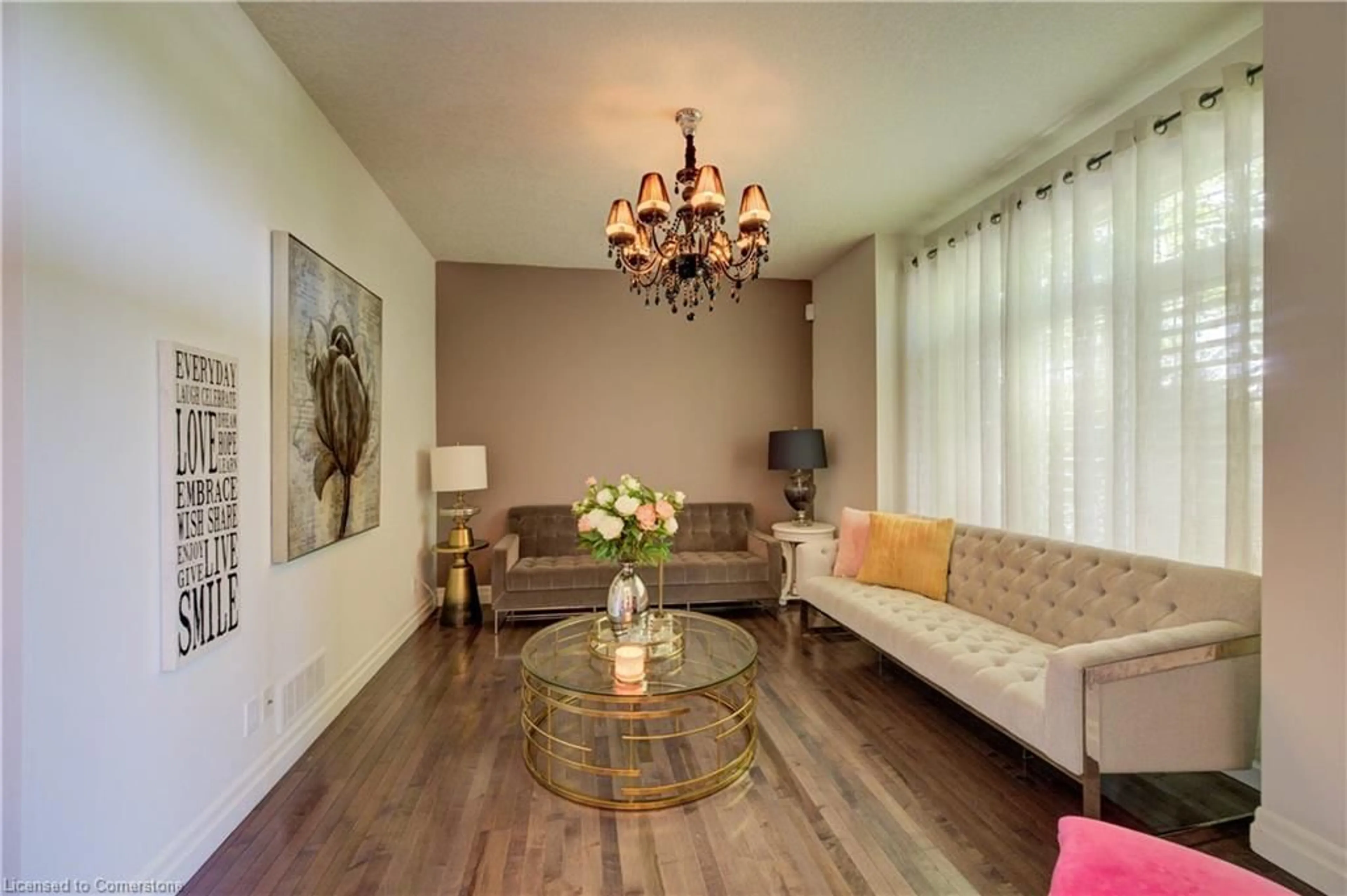 Living room with furniture, wood/laminate floor for 75 Wagon St, Kitchener Ontario N2P 2V2