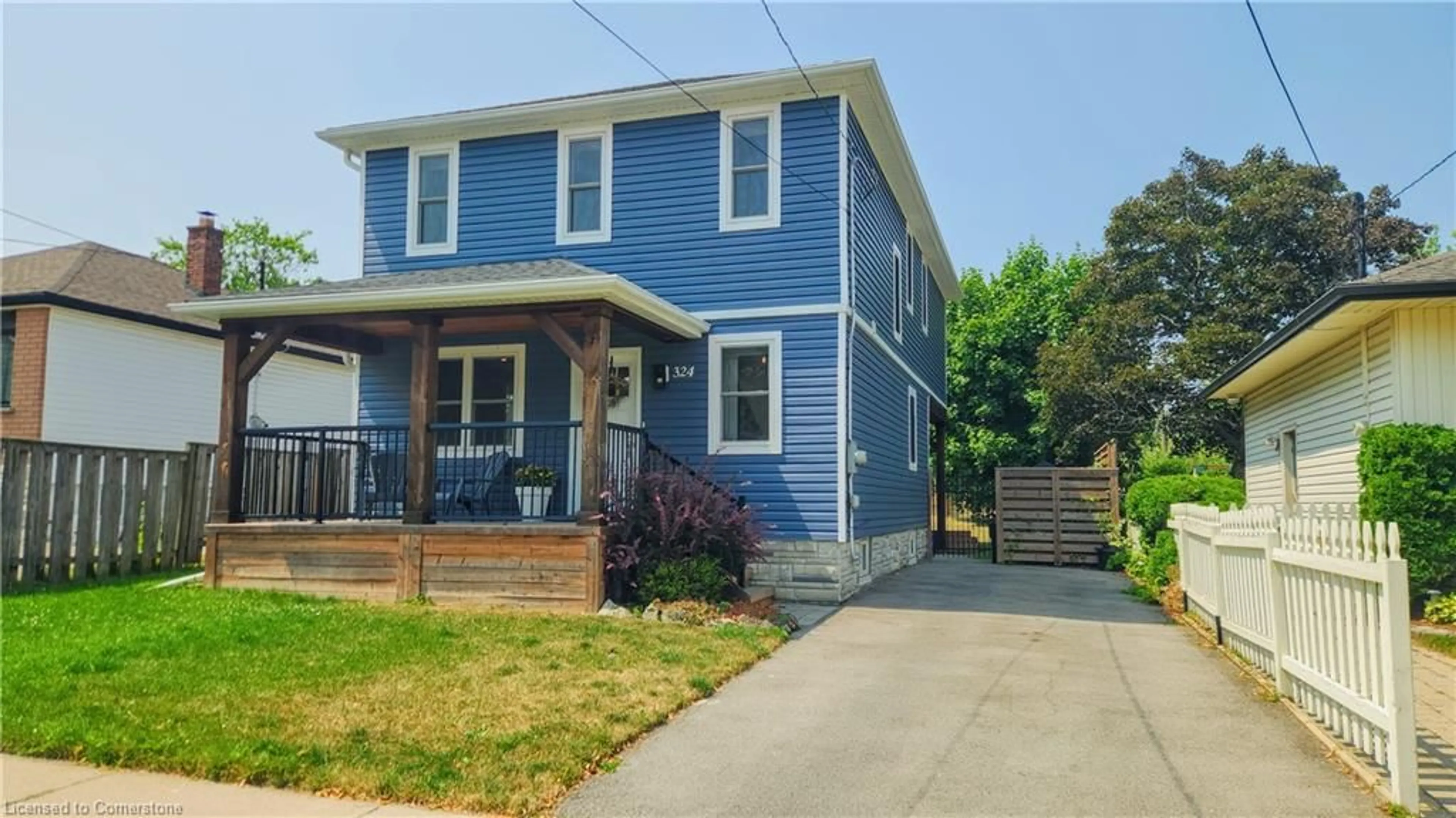Home with vinyl exterior material, street for 324 East 43rd St, Hamilton Ontario L8T 3C7