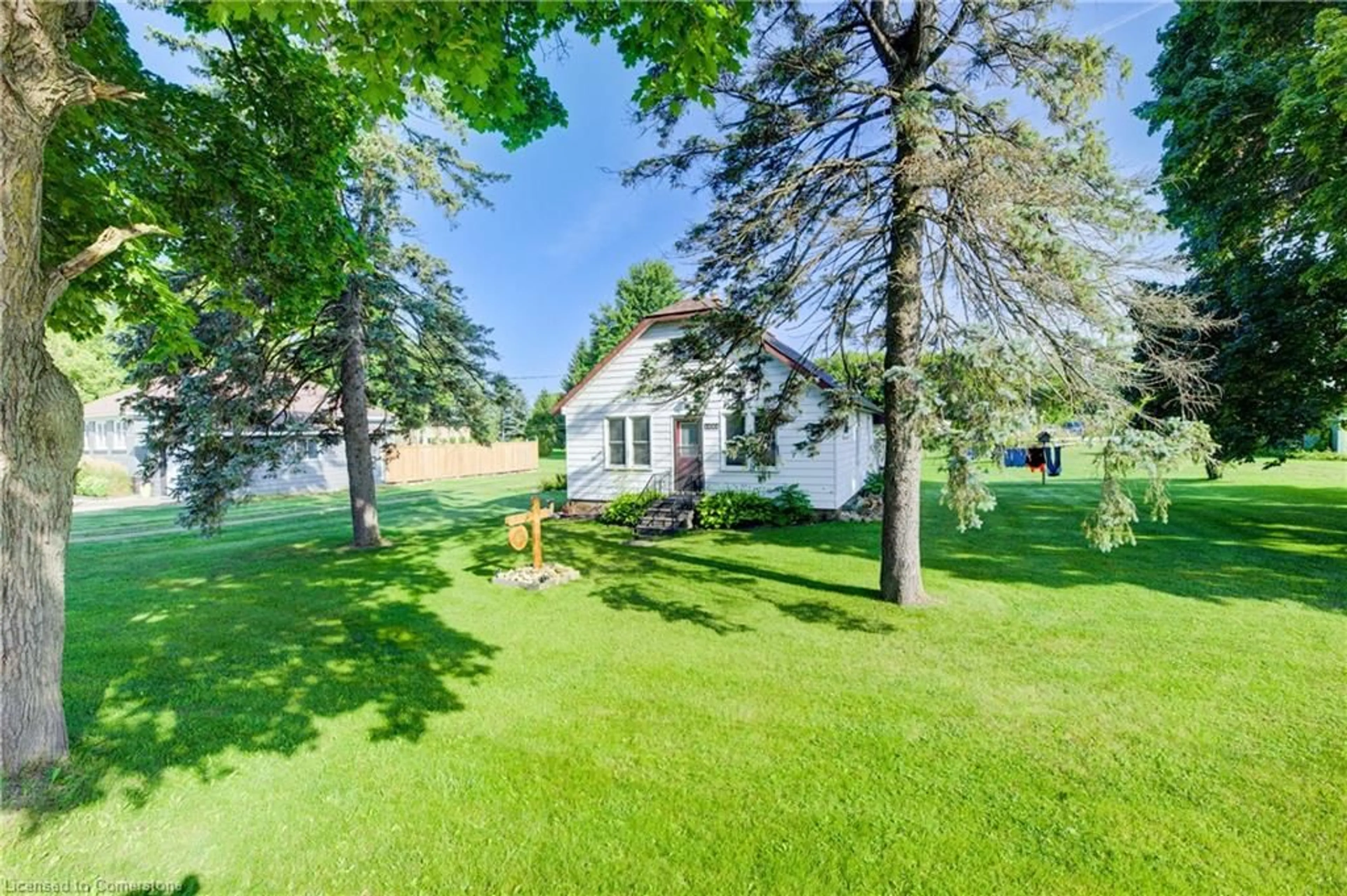 A pic from outside/outdoor area/front of a property/back of a property/a pic from drone, water/lake/river/ocean view for 1081 Harriston Rd, Wroxeter Ontario N0G 2X0