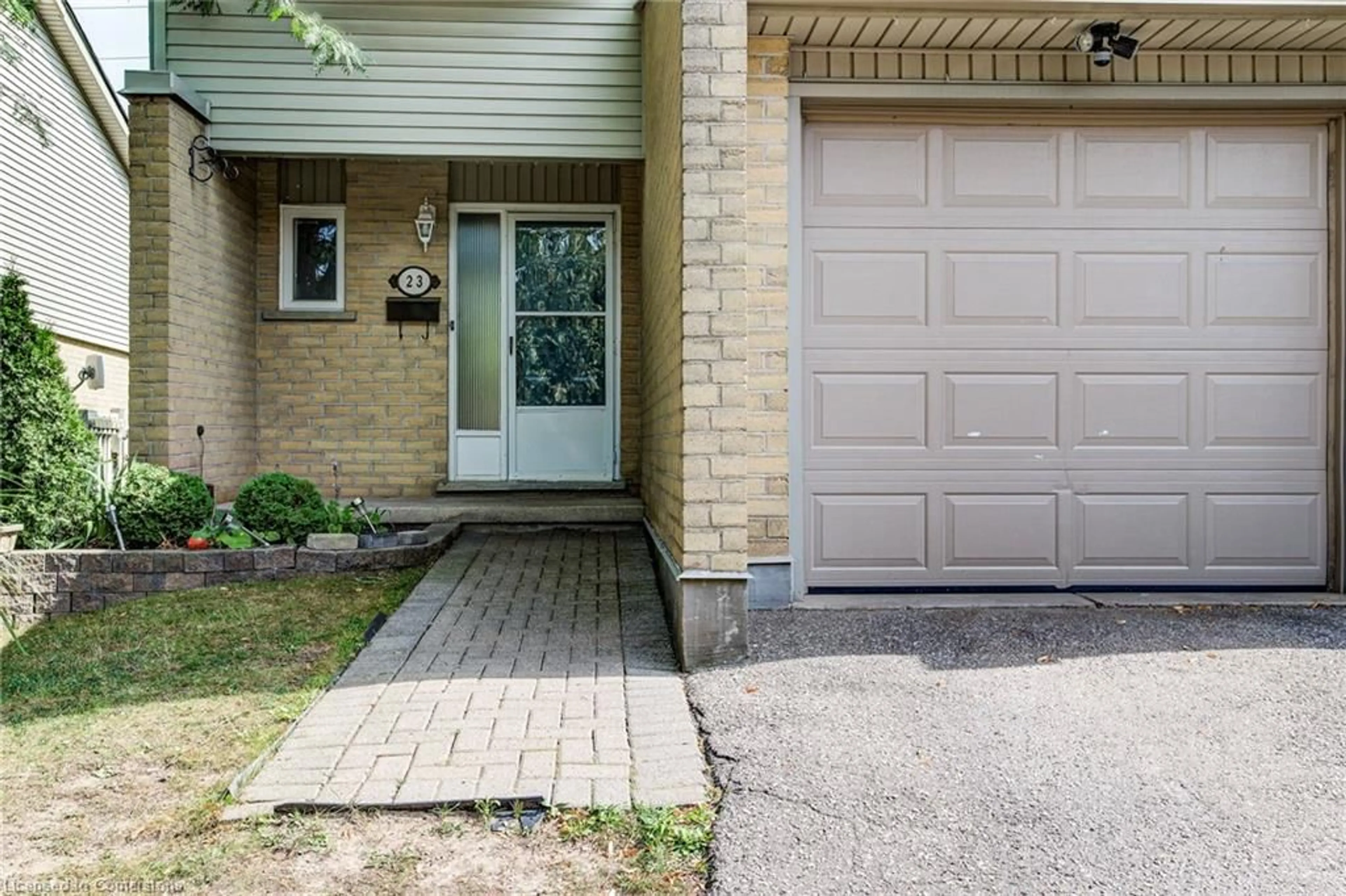 Home with brick exterior material, street for 29 Paulander Dr #23, Kitchener Ontario N2M 5L2