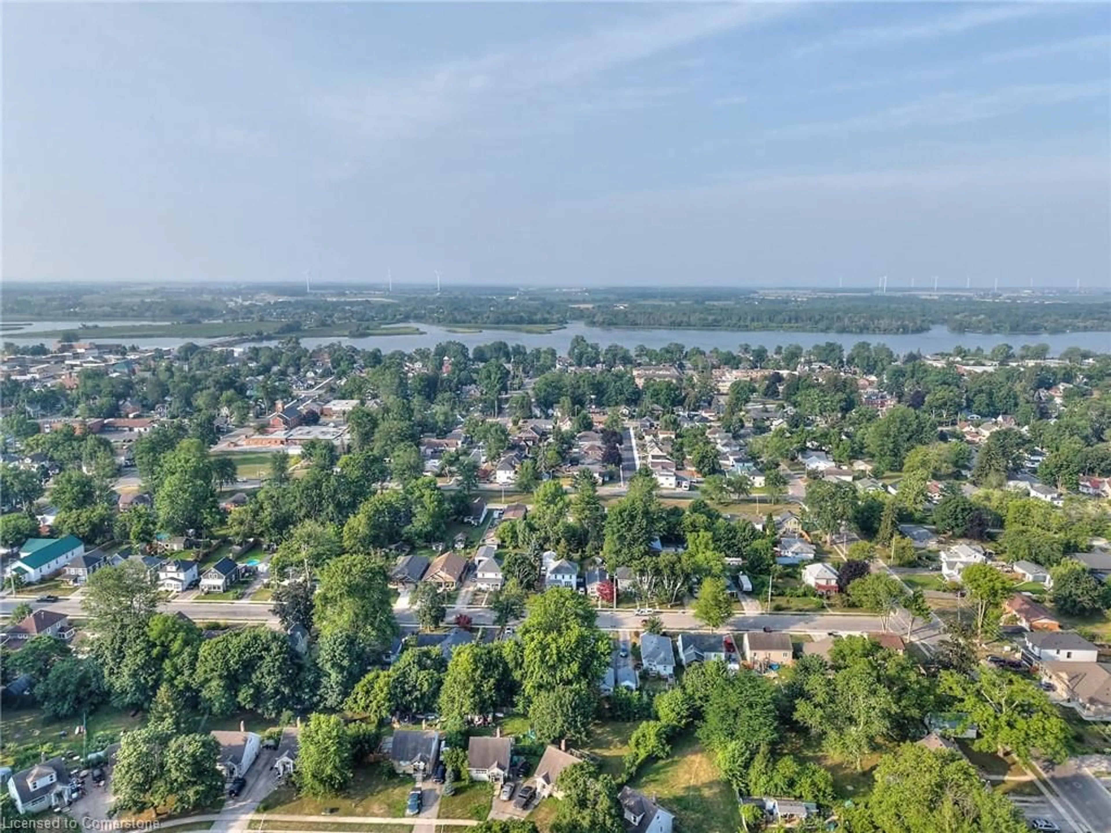 A pic from outside/outdoor area/front of a property/back of a property/a pic from drone, water/lake/river/ocean view for 303 Park Ave, Dunnville Ontario N1A 1M7