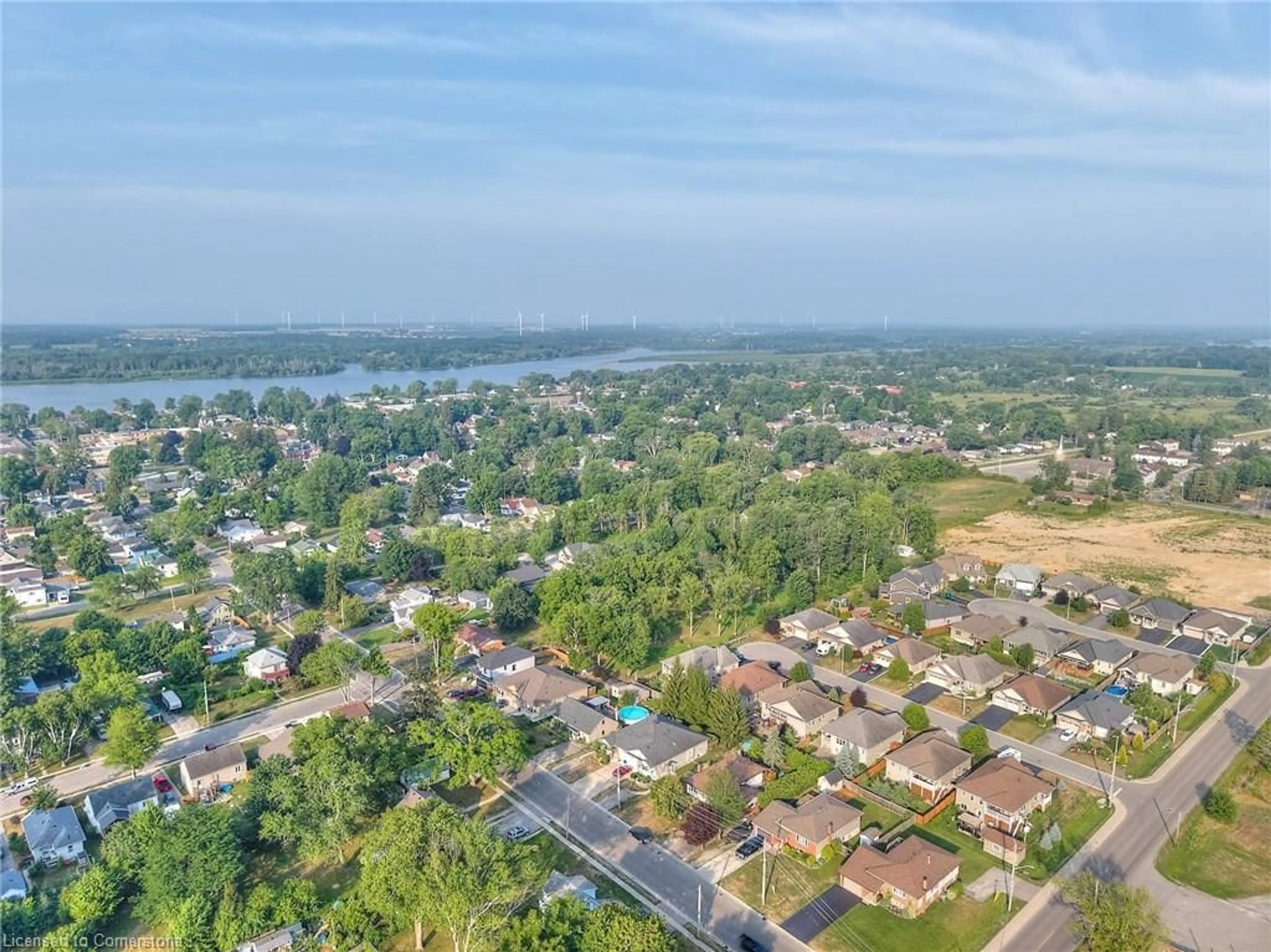 A pic from outside/outdoor area/front of a property/back of a property/a pic from drone, water/lake/river/ocean view for 303 Park Ave, Dunnville Ontario N1A 1M7