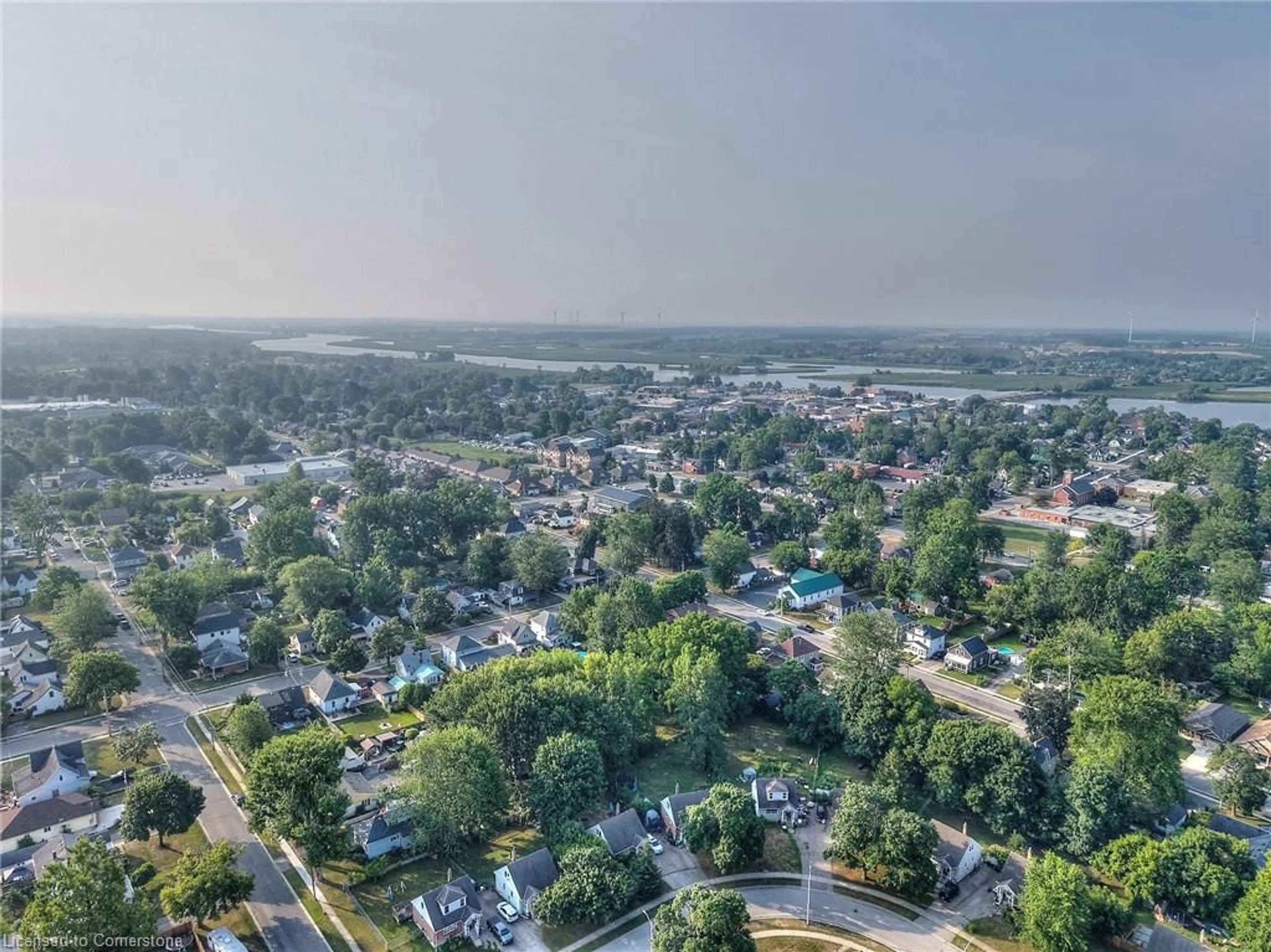 A pic from outside/outdoor area/front of a property/back of a property/a pic from drone, water/lake/river/ocean view for 303 Park Ave, Dunnville Ontario N1A 1M7