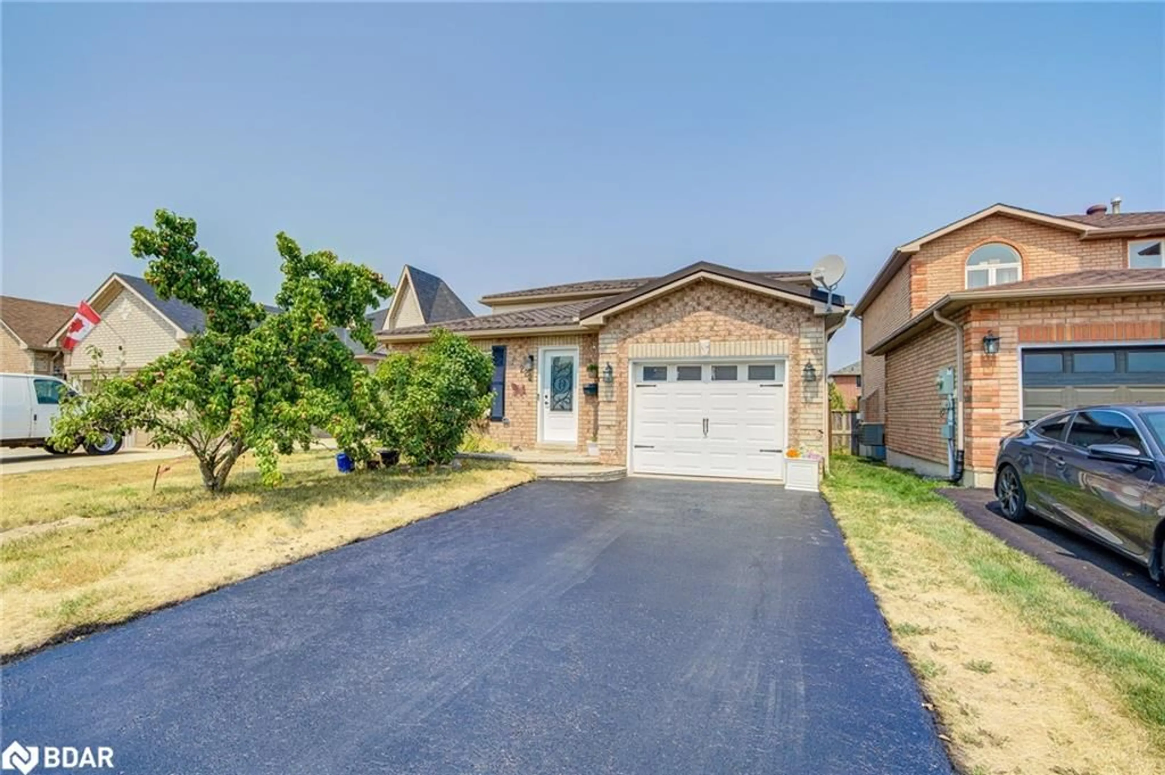 Home with brick exterior material, street for 222 Country Lane, Barrie Ontario L4N 0W1