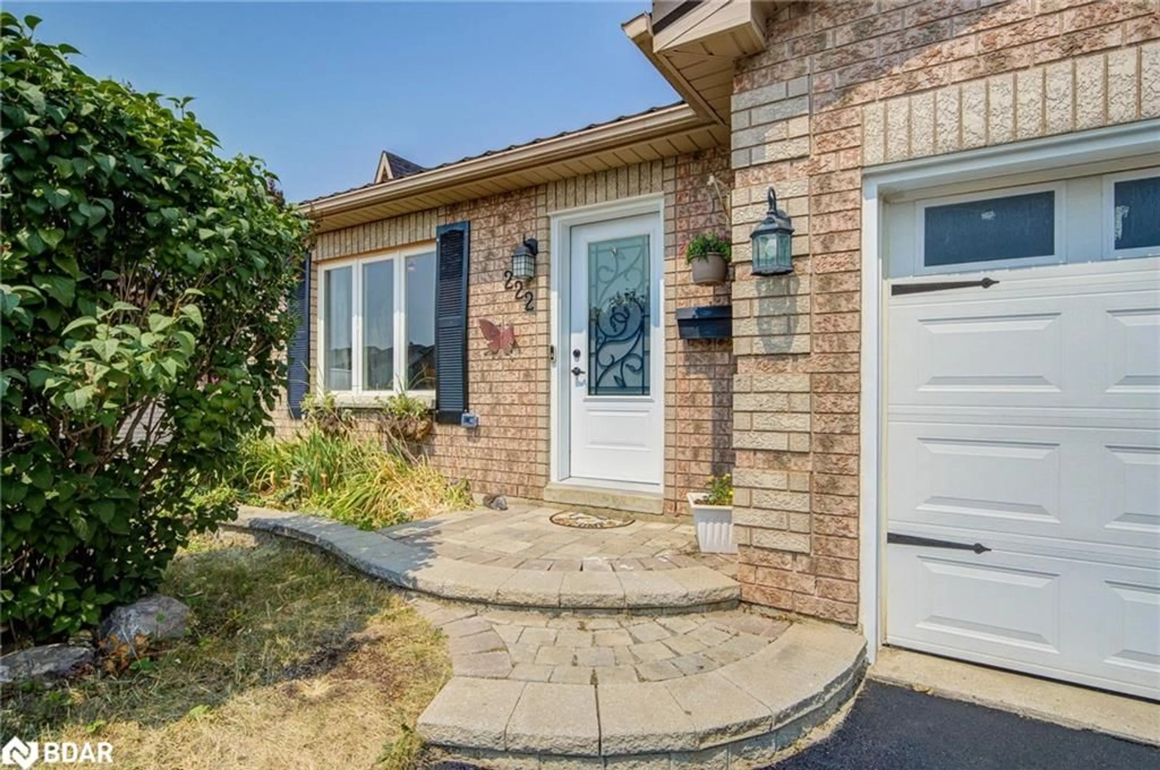 Home with brick exterior material, street for 222 Country Lane, Barrie Ontario L4N 0W1
