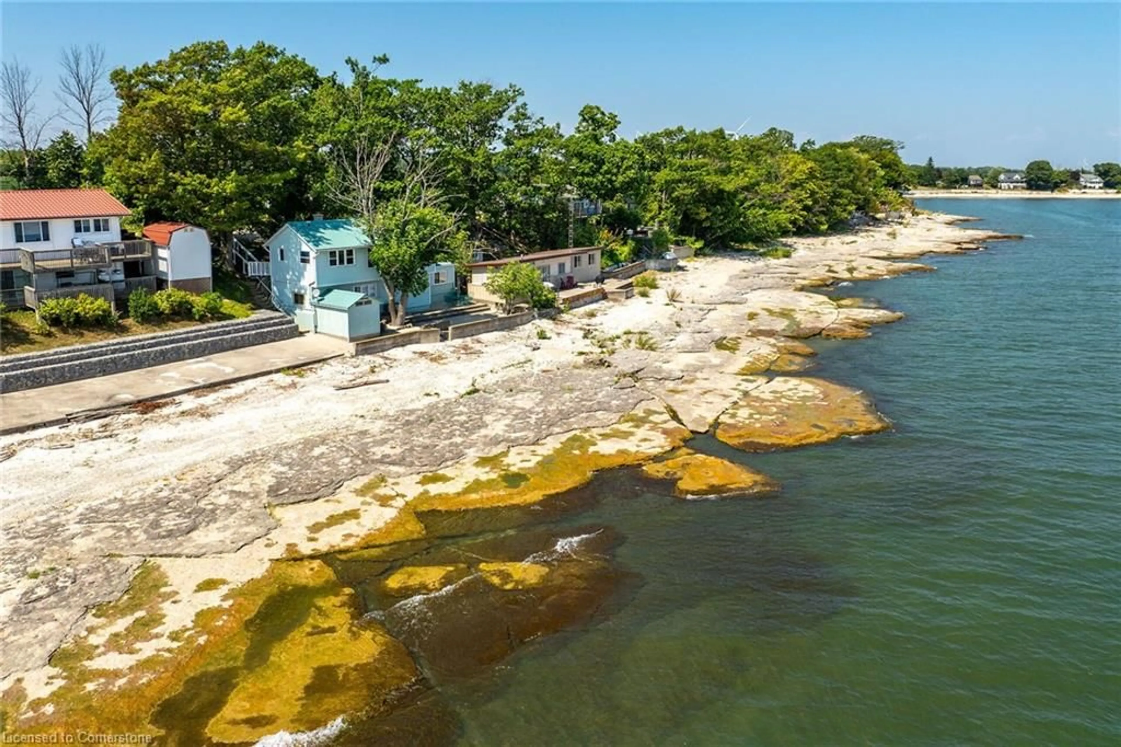 A pic from outside/outdoor area/front of a property/back of a property/a pic from drone, water/lake/river/ocean view for 157 Lighthouse Dr, Port Maitland Ontario N1A 2W6