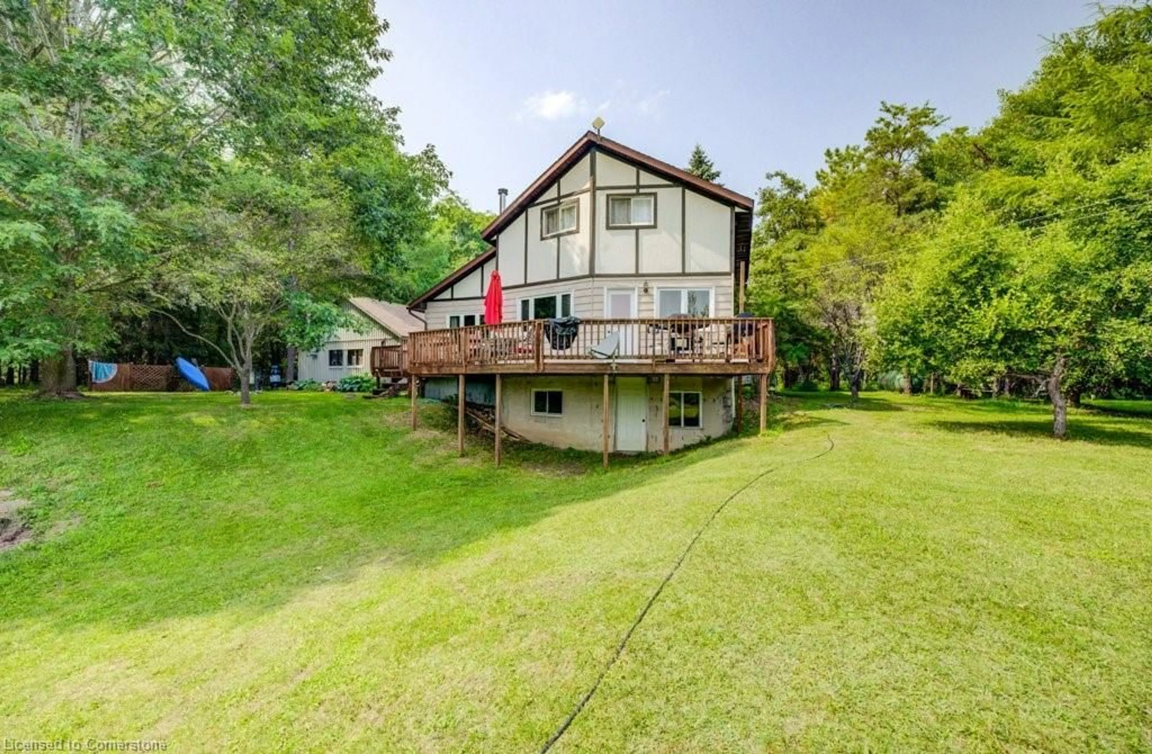 A pic from outside/outdoor area/front of a property/back of a property/a pic from drone, water/lake/river/ocean view for 7589 Highway 89, Wellington North Ontario N0G 2E0