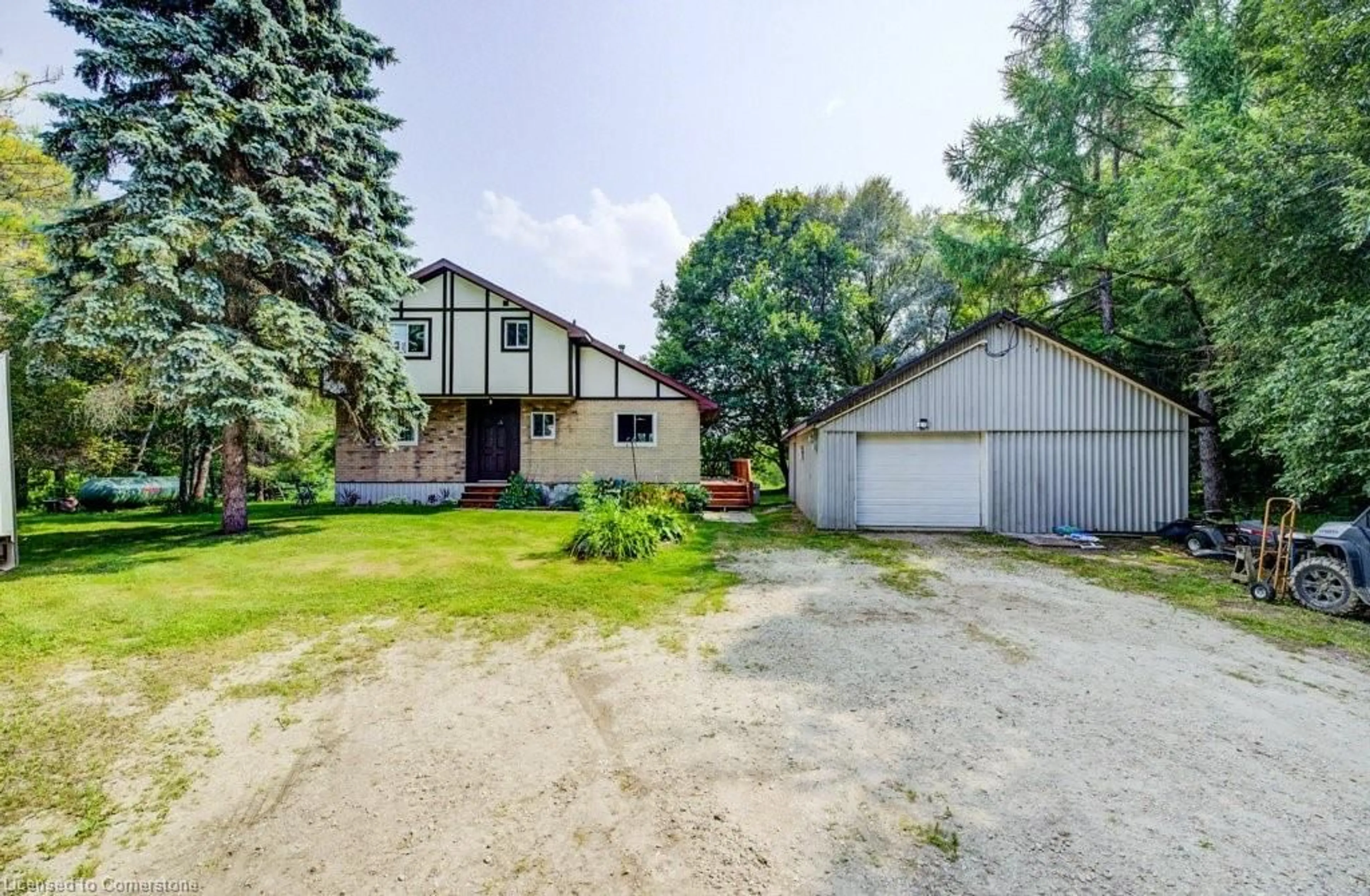 A pic from outside/outdoor area/front of a property/back of a property/a pic from drone, street for 7589 Highway 89, Wellington North Ontario N0G 2E0