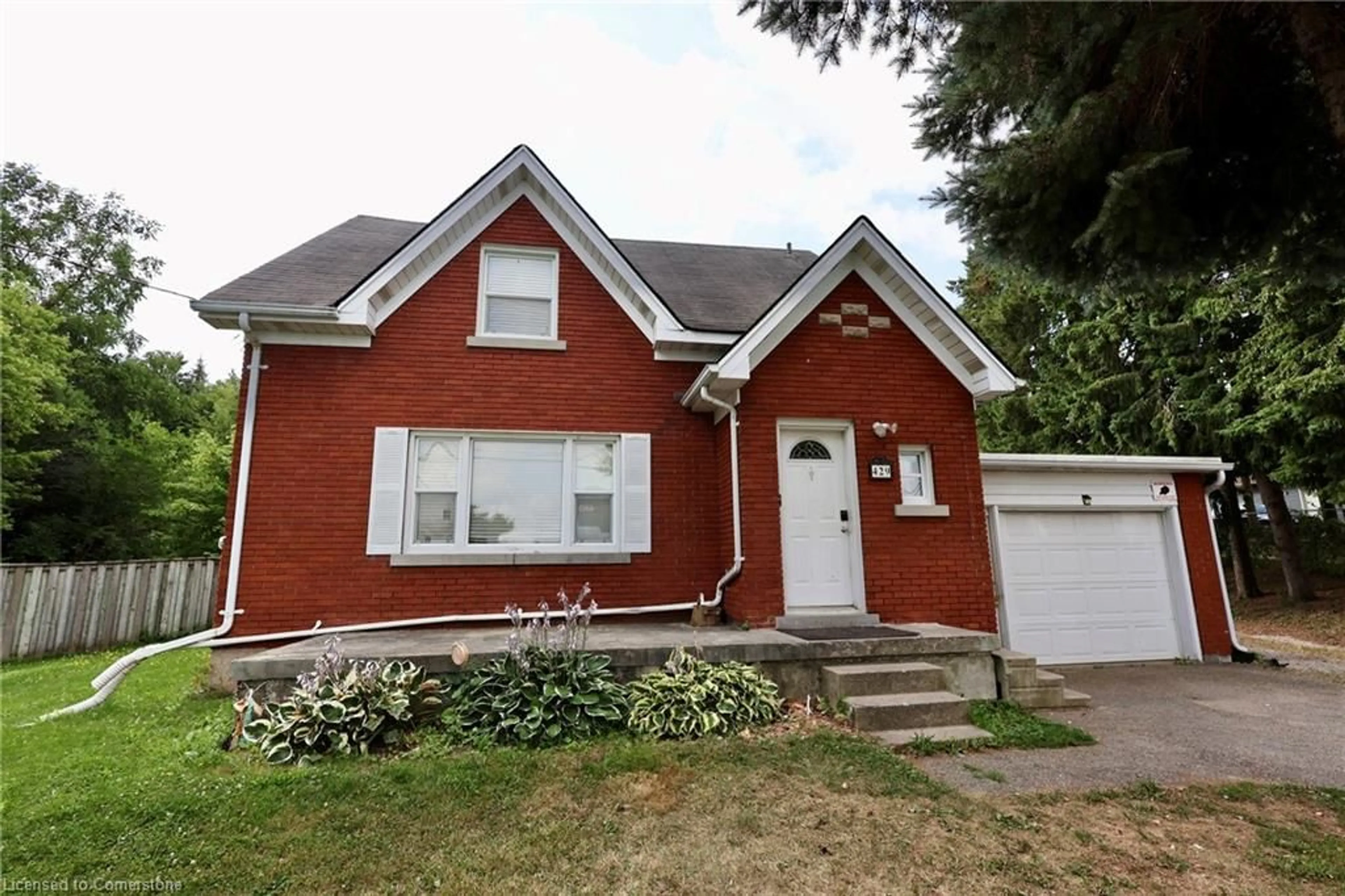 Home with brick exterior material, street for 429 Erb St, Waterloo Ontario N2T 1A1