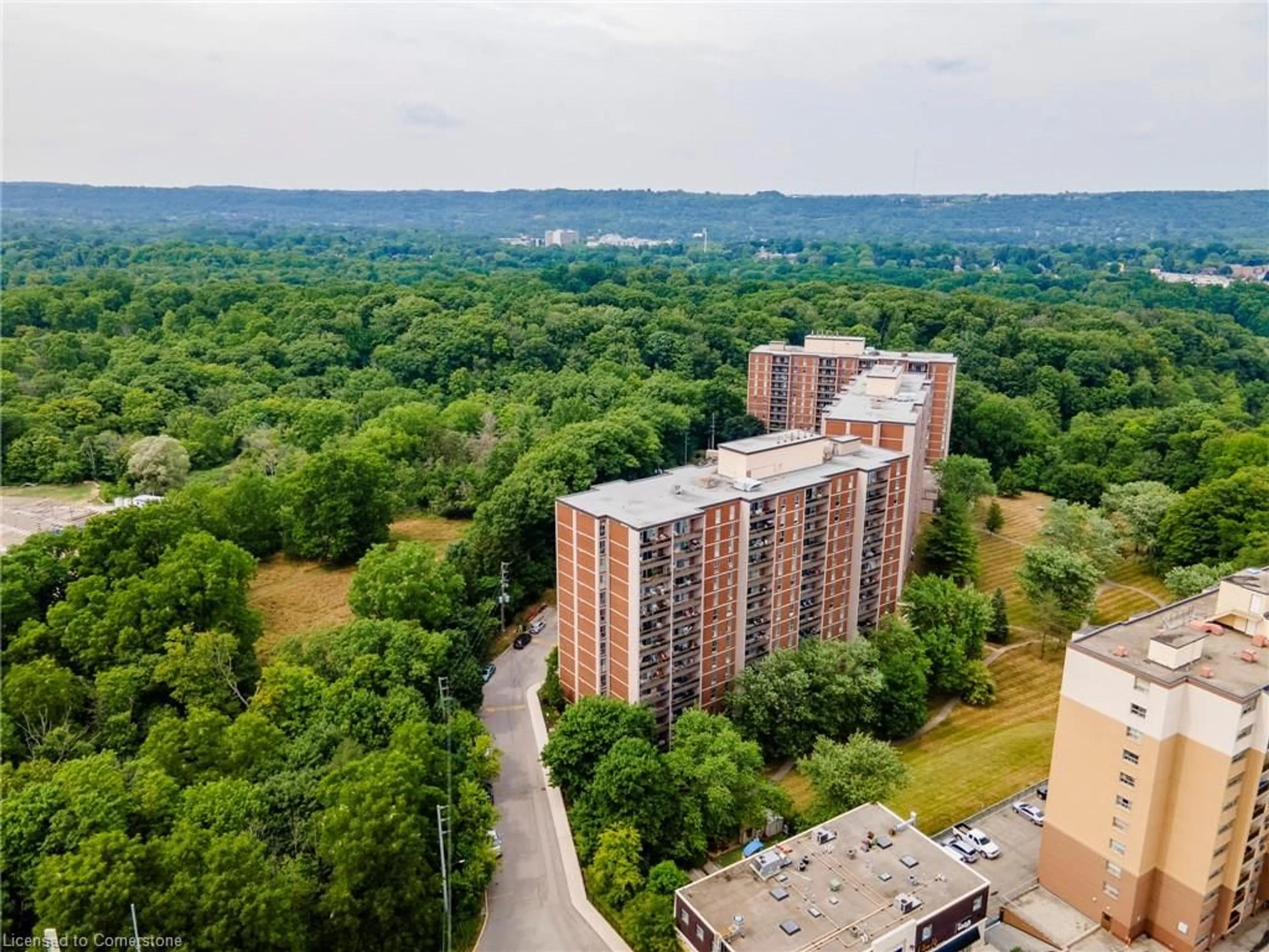A pic from outside/outdoor area/front of a property/back of a property/a pic from drone, city buildings view from balcony for 1964 Main St #707, Hamilton Ontario L8S 1J5