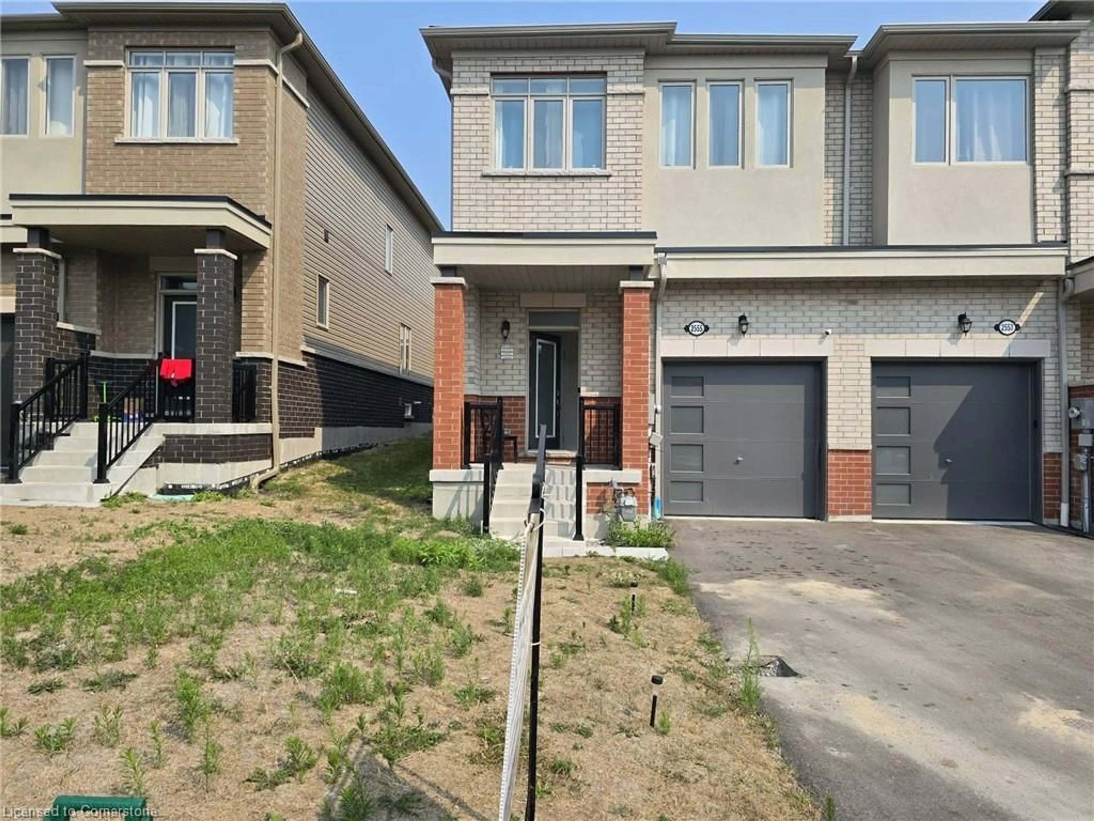 Home with brick exterior material, street for 2555 Winter Words Drive Dr, Oshawa Ontario L1H 7K4