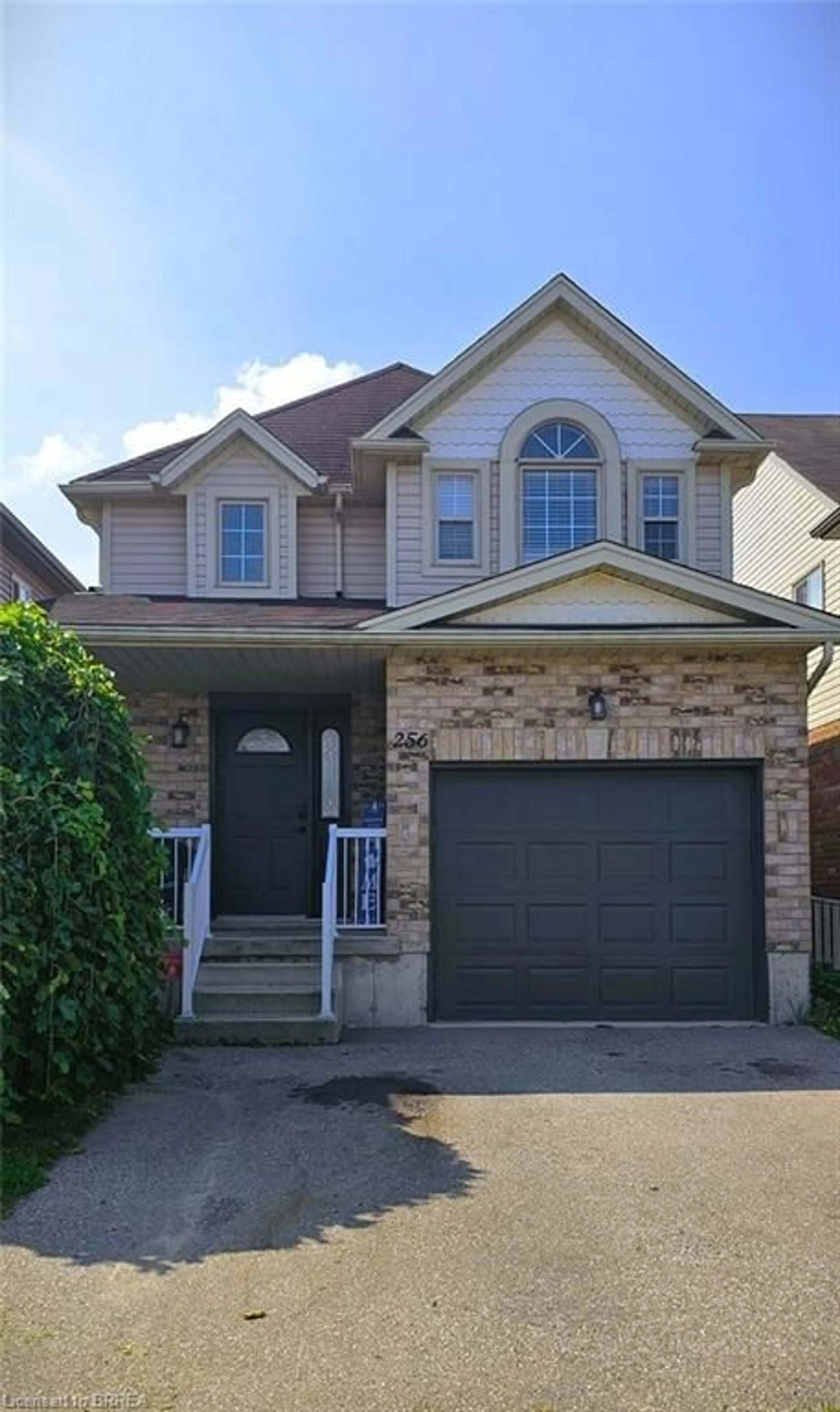 Home with brick exterior material, street for 256 Sienna Cres, Kitchener Ontario N2R 1T5