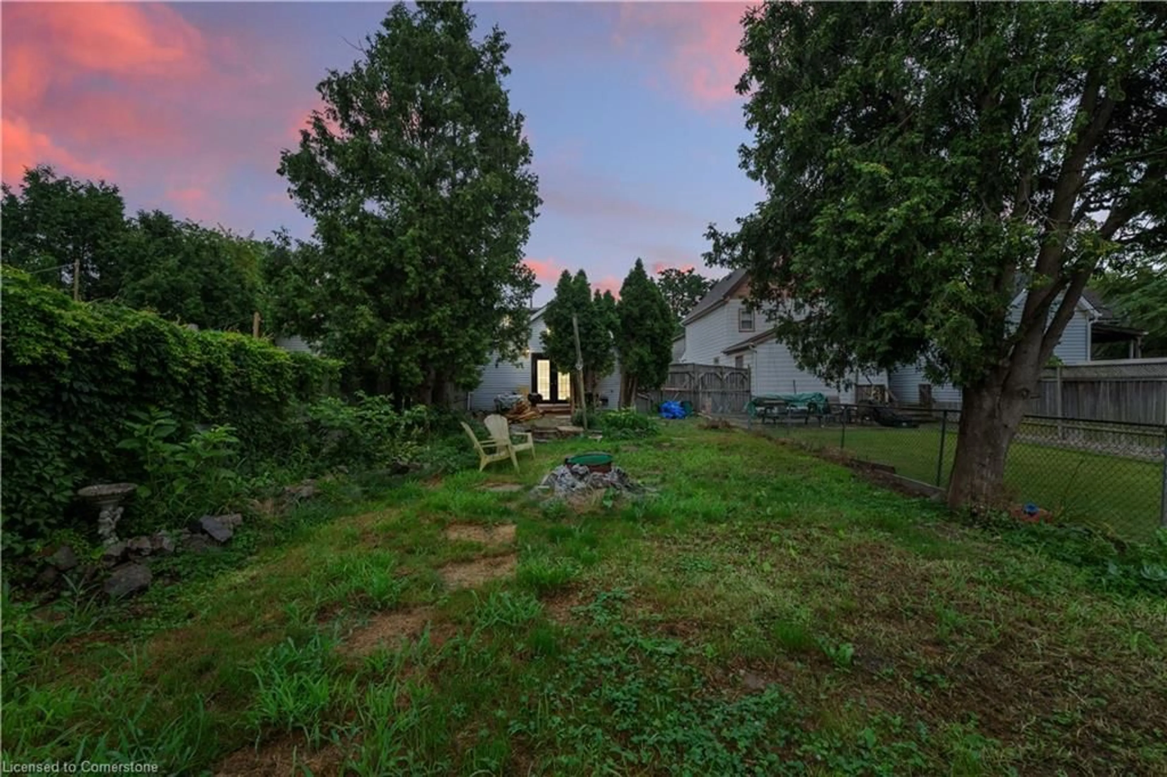 A pic from outside/outdoor area/front of a property/back of a property/a pic from drone, forest/trees view for 411 Mary St, Hamilton Ontario L8L 4W7