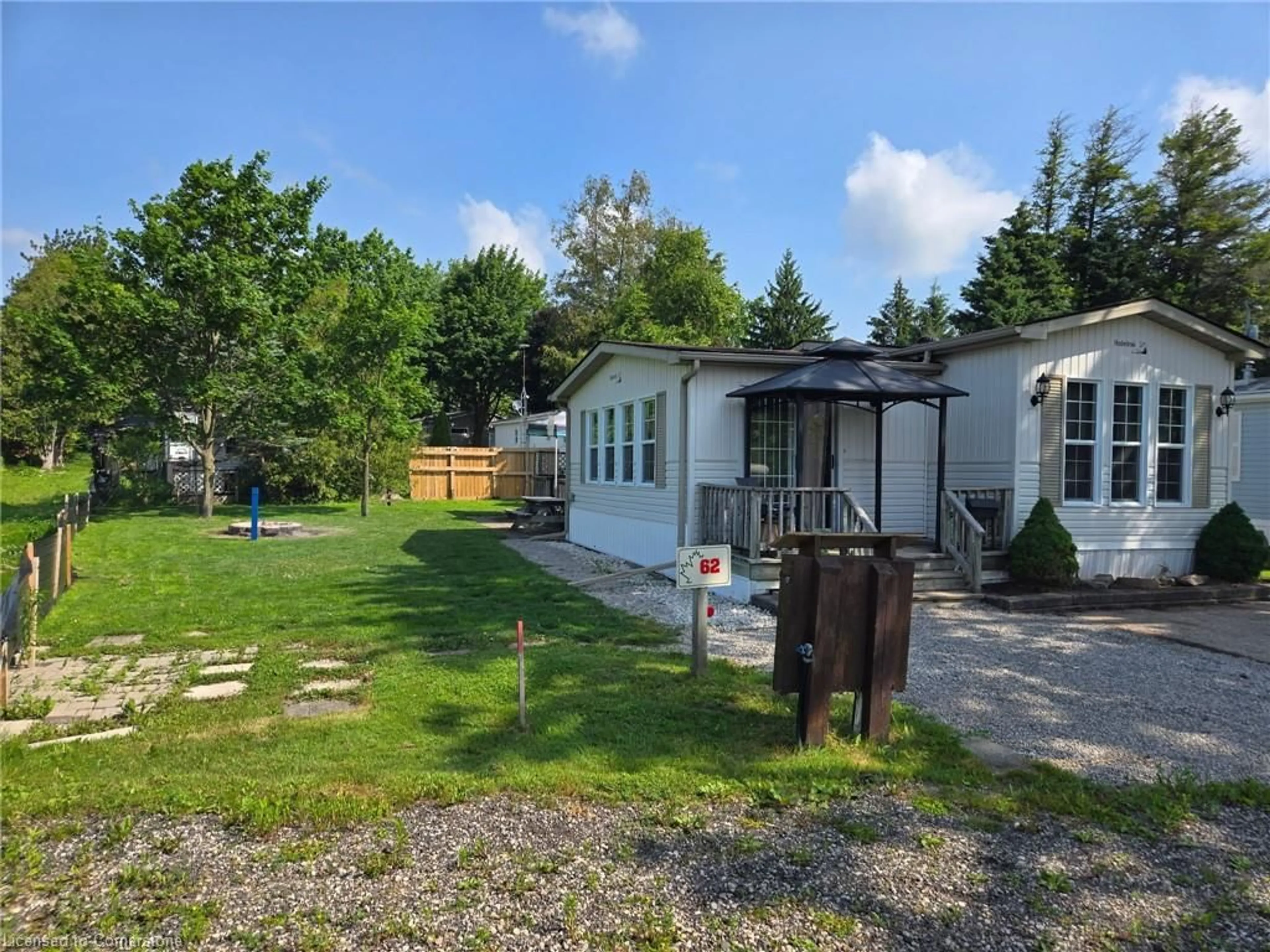 A pic from outside/outdoor area/front of a property/back of a property/a pic from drone, unknown for 580 Beaver Creek Rd #62, Waterloo Ontario N2J 3Z4