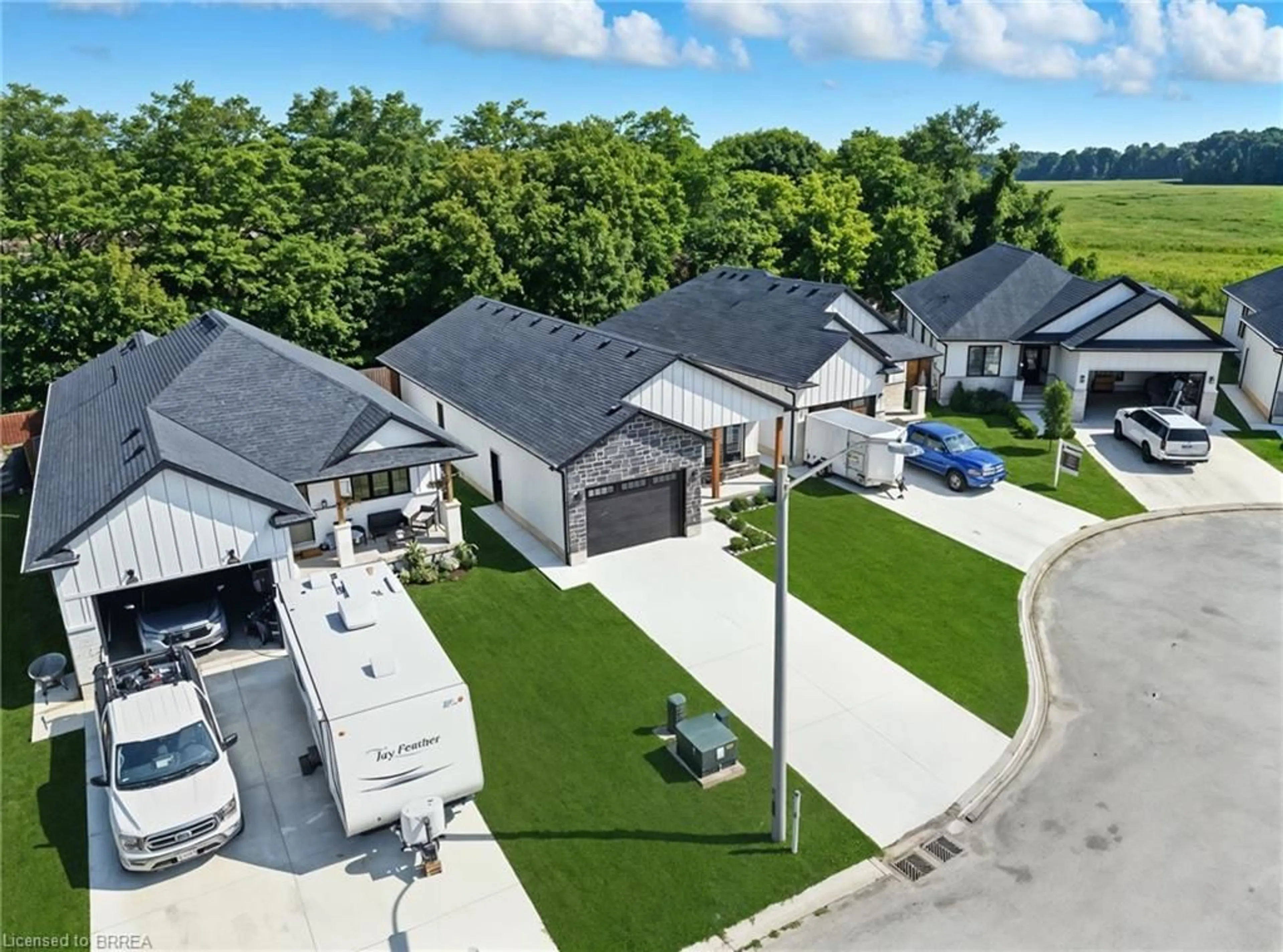 A pic from outside/outdoor area/front of a property/back of a property/a pic from drone, street for 7 Macneil Crt, Port Burwell Ontario N0J 1T0