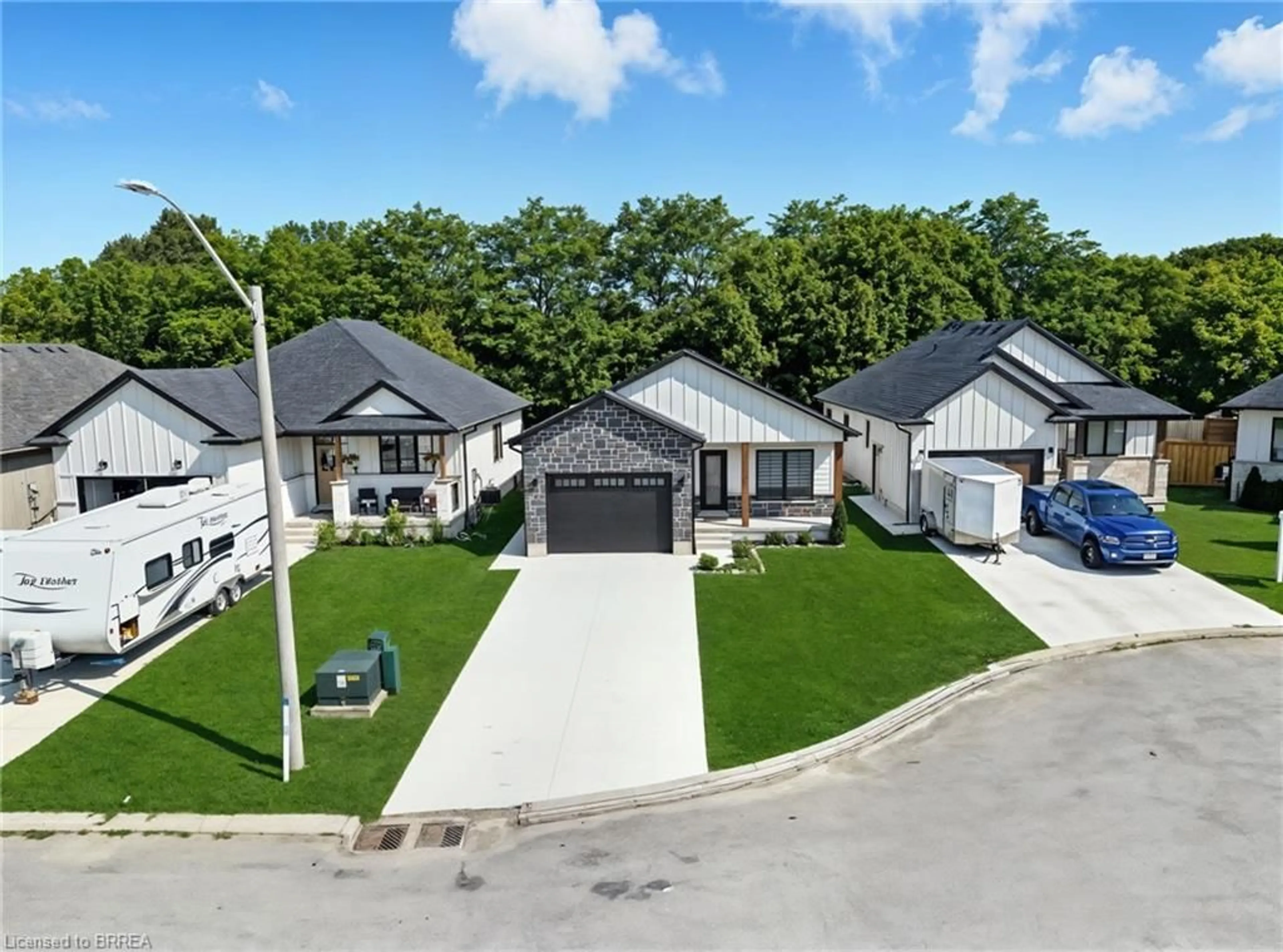 A pic from outside/outdoor area/front of a property/back of a property/a pic from drone, street for 7 Macneil Crt, Port Burwell Ontario N0J 1T0