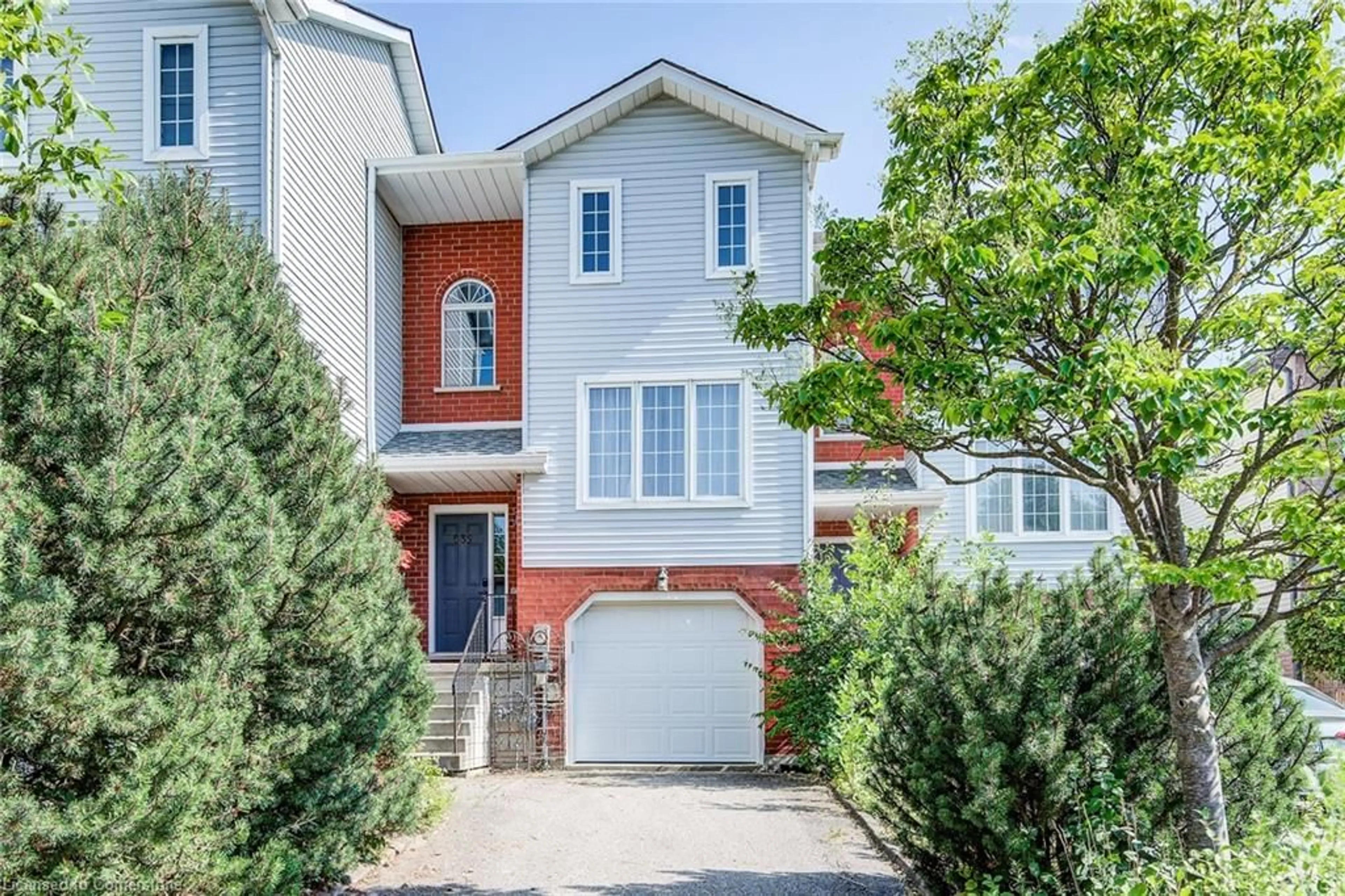 Home with brick exterior material, street for 635 Grange Cres, Waterloo Ontario N2T 2L9