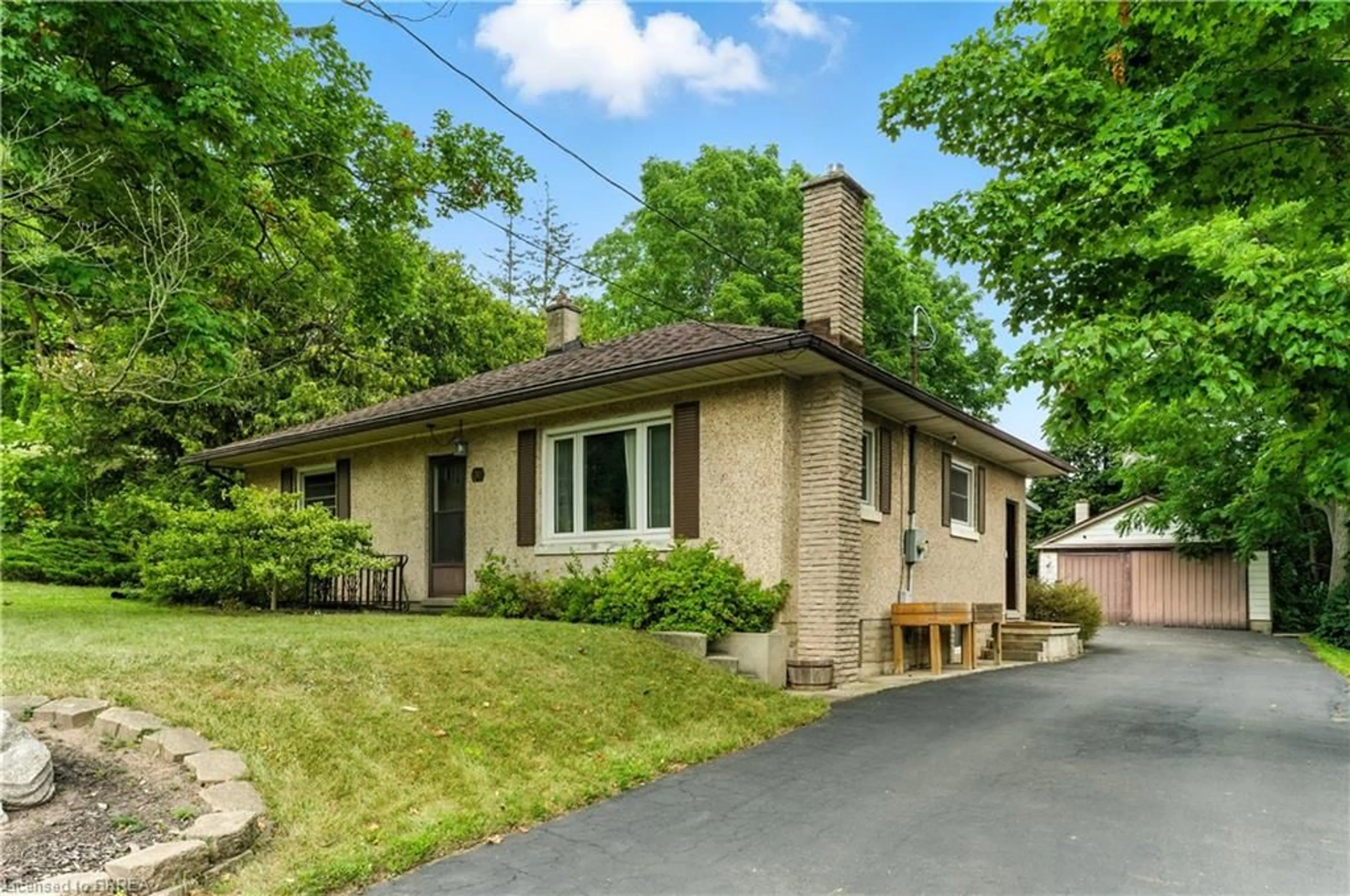 Home with brick exterior material, street for 30 Main St, St. George Ontario N0E 1N0