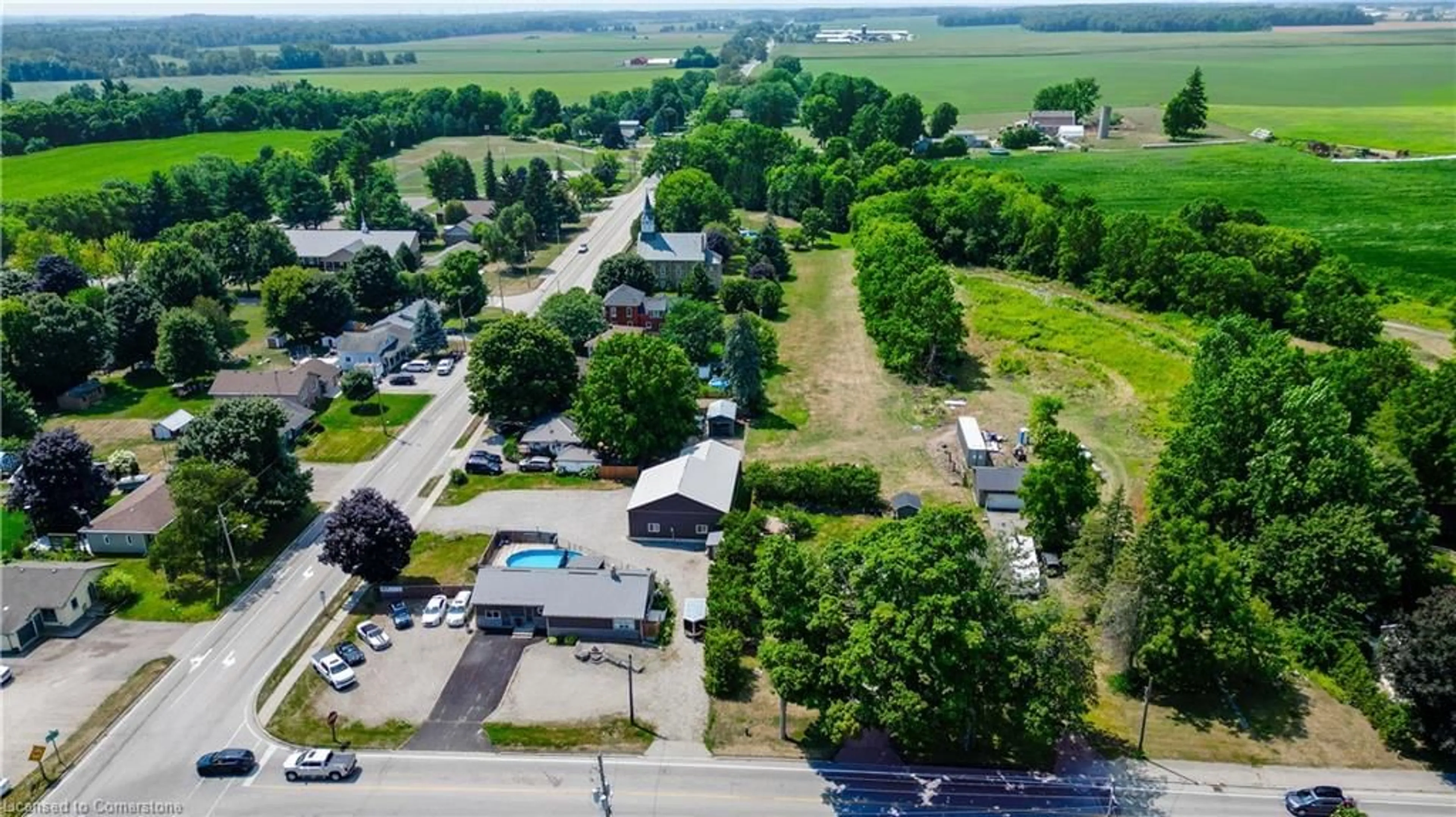 A pic from outside/outdoor area/front of a property/back of a property/a pic from drone, street for 4 West Street North St, Springford Ontario N0J 1X0