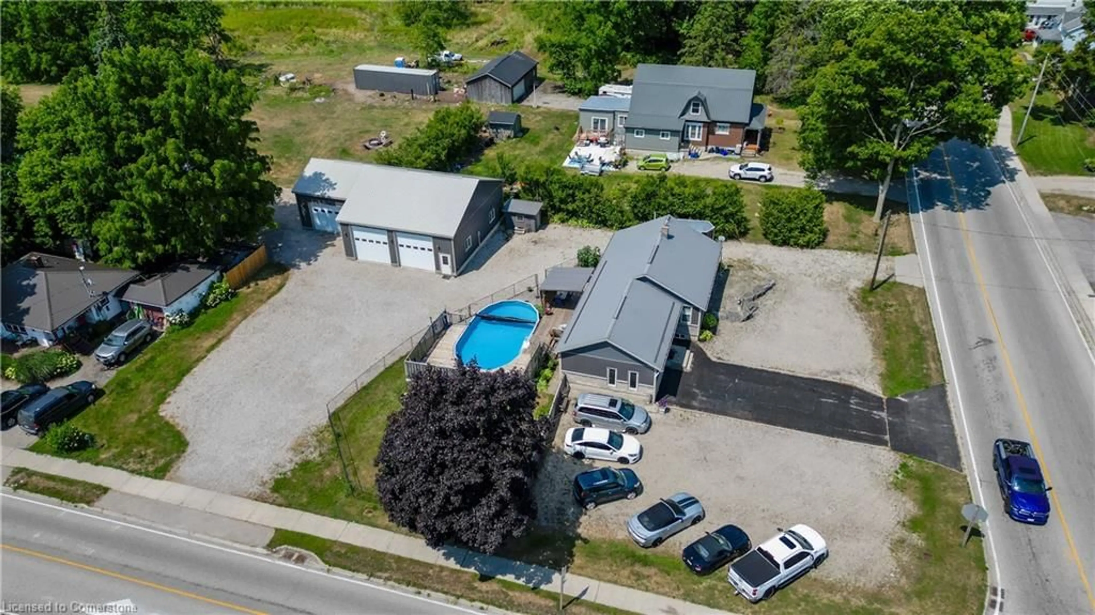 A pic from outside/outdoor area/front of a property/back of a property/a pic from drone, street for 4 West Street North St, Springford Ontario N0J 1X0