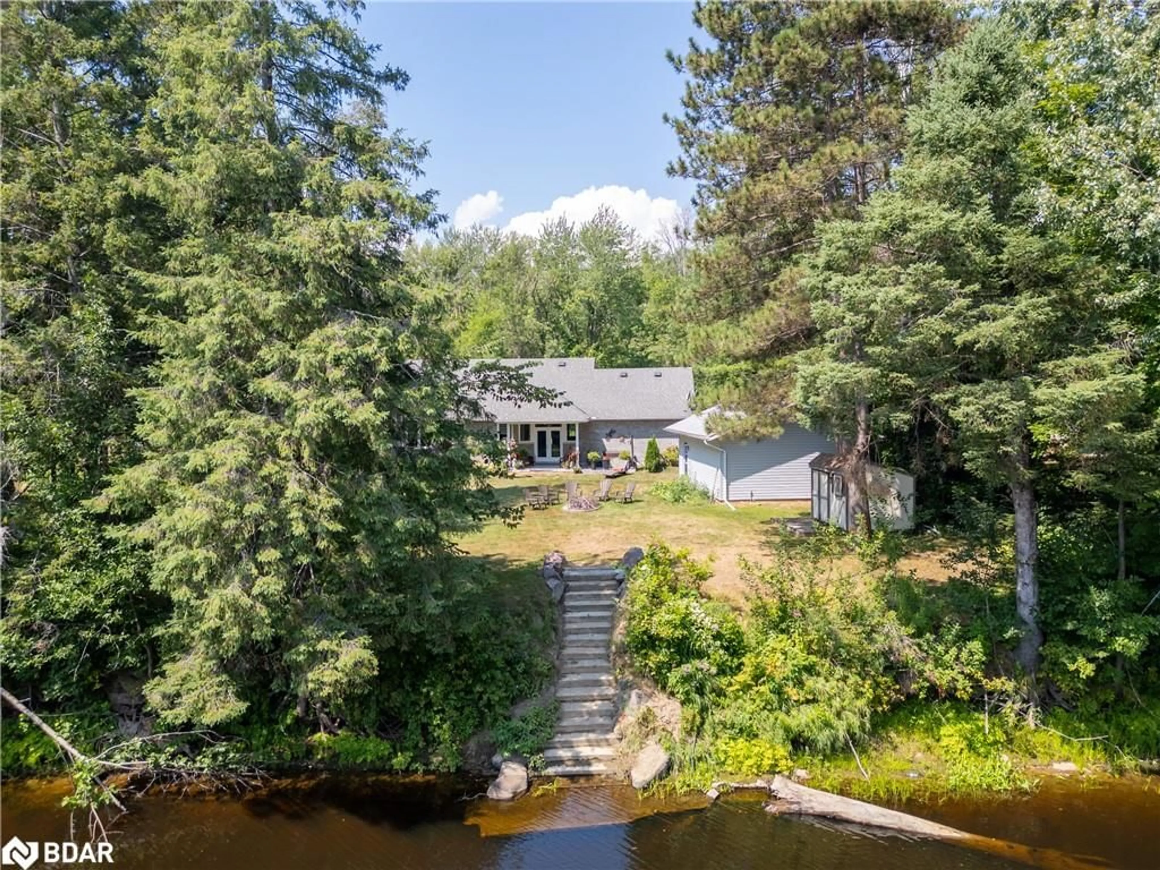 A pic from outside/outdoor area/front of a property/back of a property/a pic from drone, water/lake/river/ocean view for 7249 Davy Dr, Washago Ontario L0K 2B0