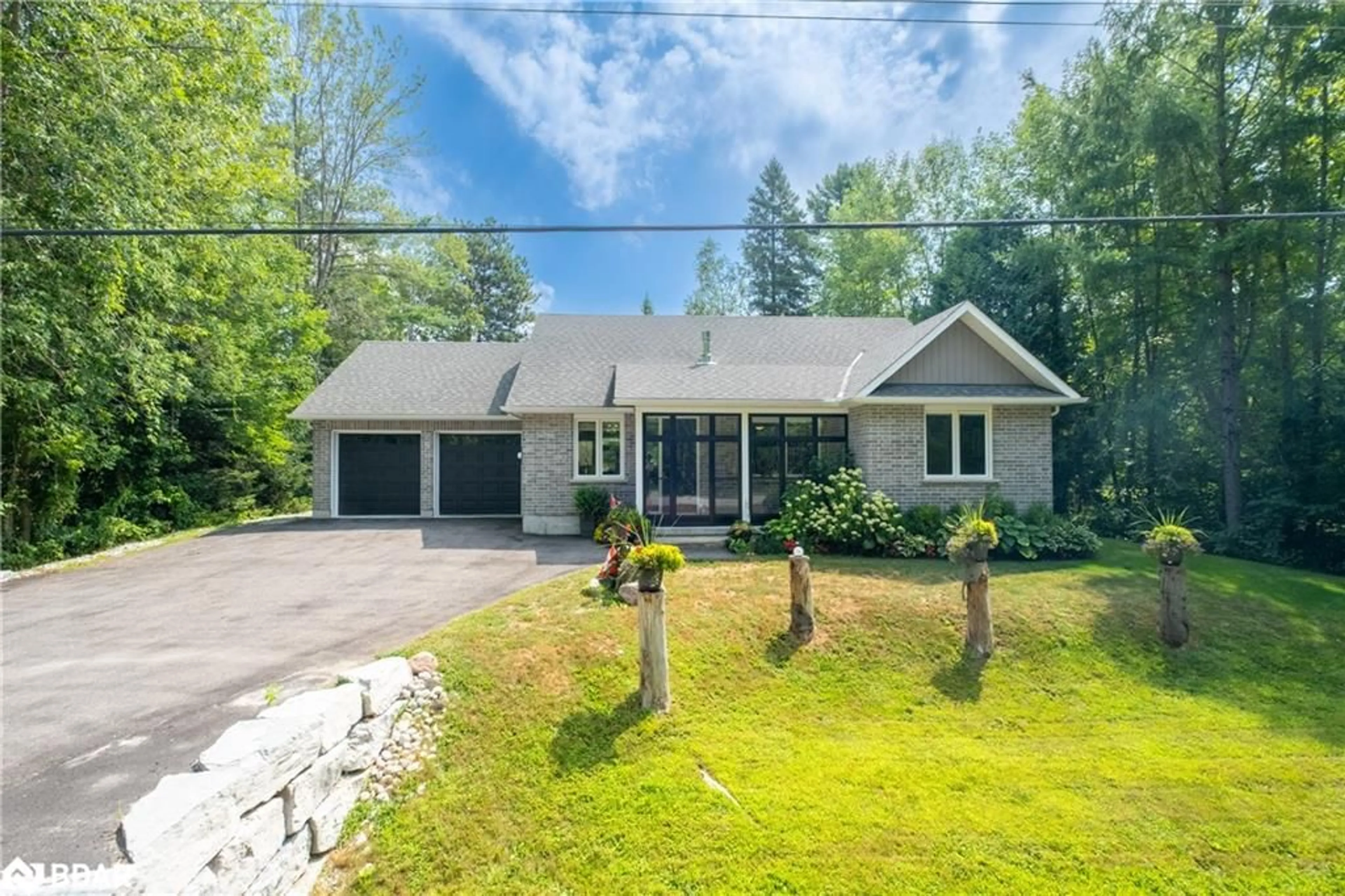 A pic from outside/outdoor area/front of a property/back of a property/a pic from drone, street for 7249 Davy Dr, Washago Ontario L0K 2B0