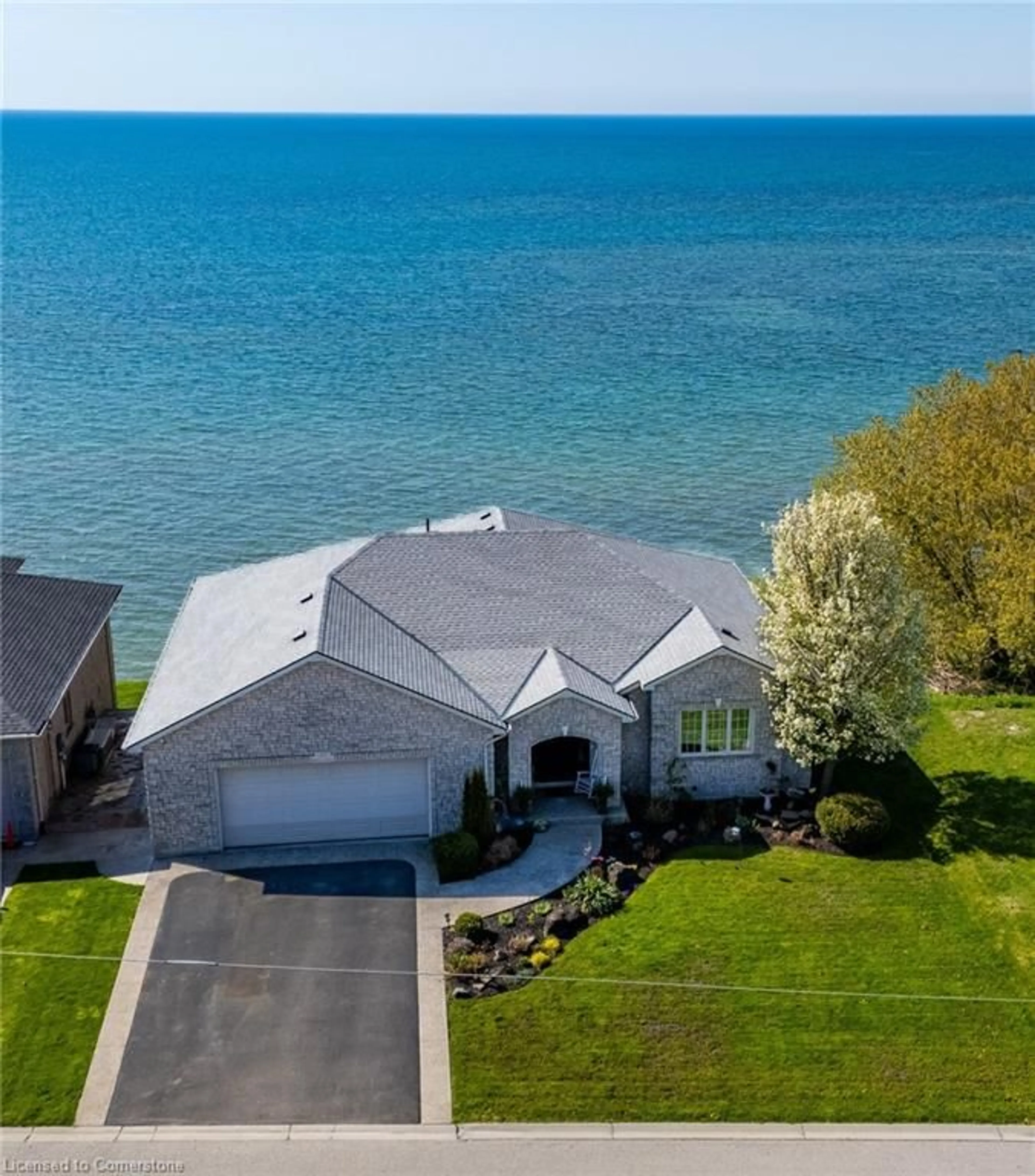A pic from outside/outdoor area/front of a property/back of a property/a pic from drone, water/lake/river/ocean view for 140 Brown St, Port Dover Ontario N0A 1N7