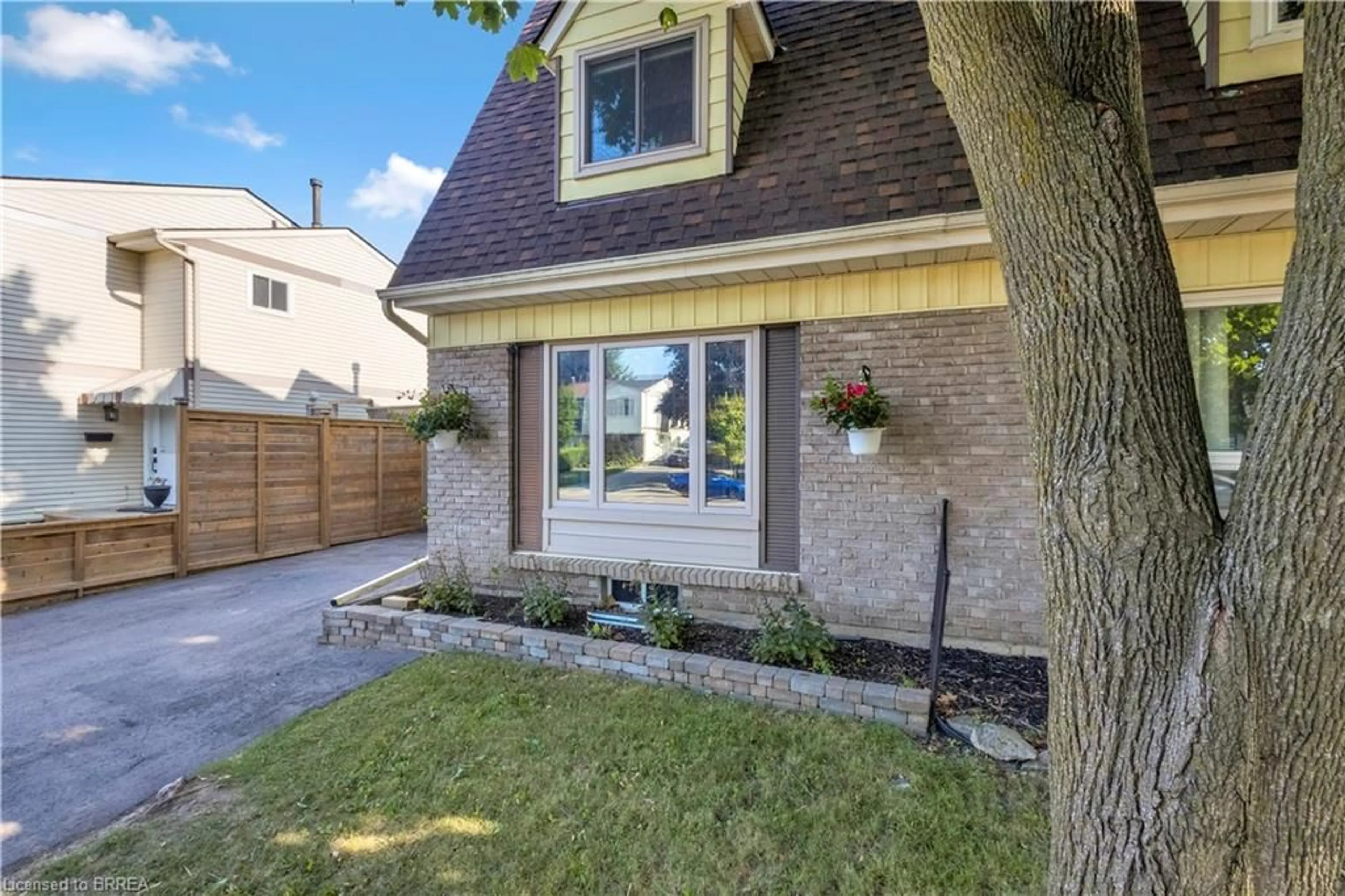 Home with brick exterior material, street for 92 White Owl Cres, Brantford Ontario N3P 1A2