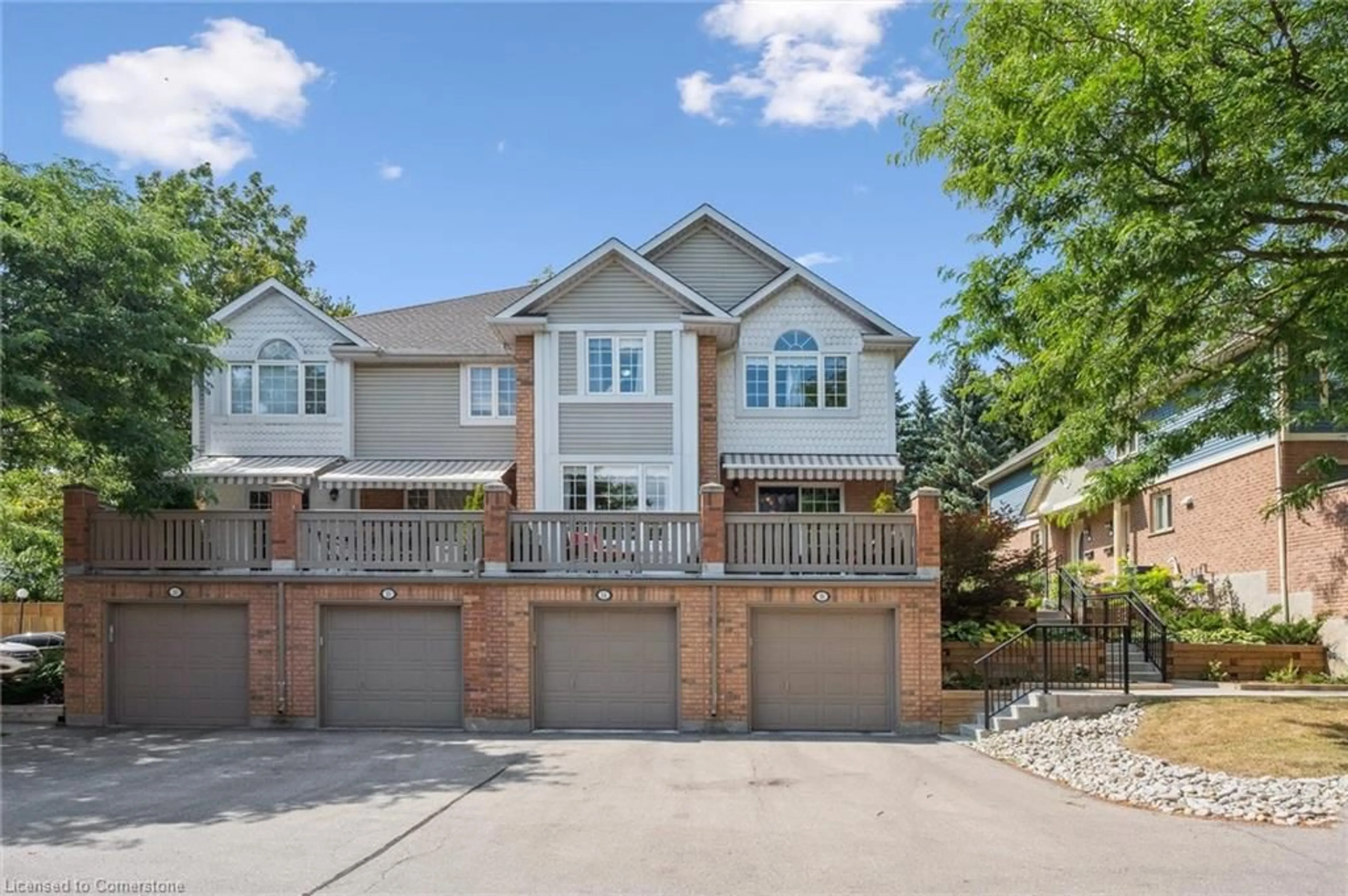 Home with brick exterior material, street for 941 Gordon St #14, Guelph Ontario N1G 4R9
