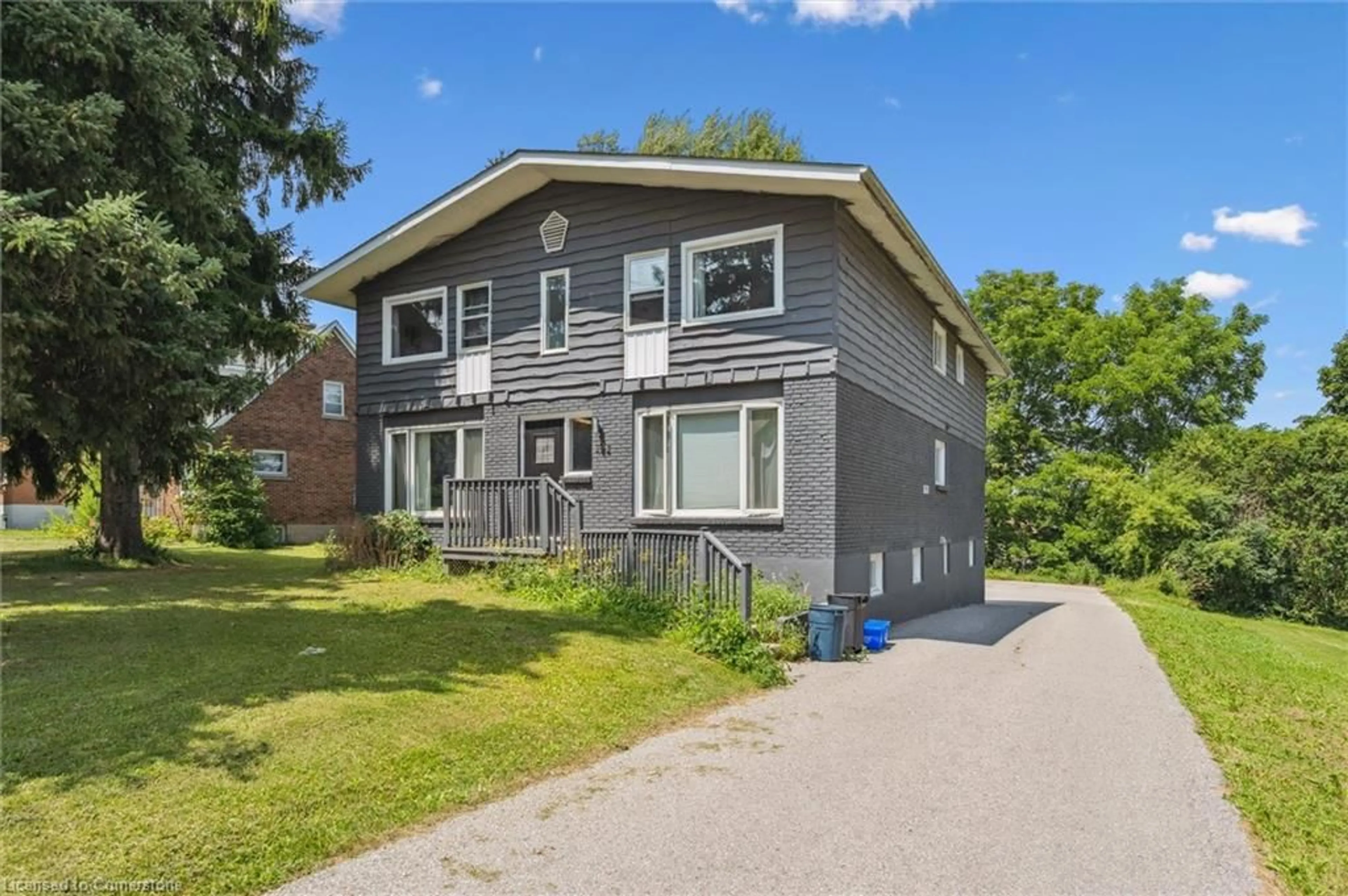 Home with brick exterior material, street for 392-398 Erb St, Waterloo Ontario N2L 1W6