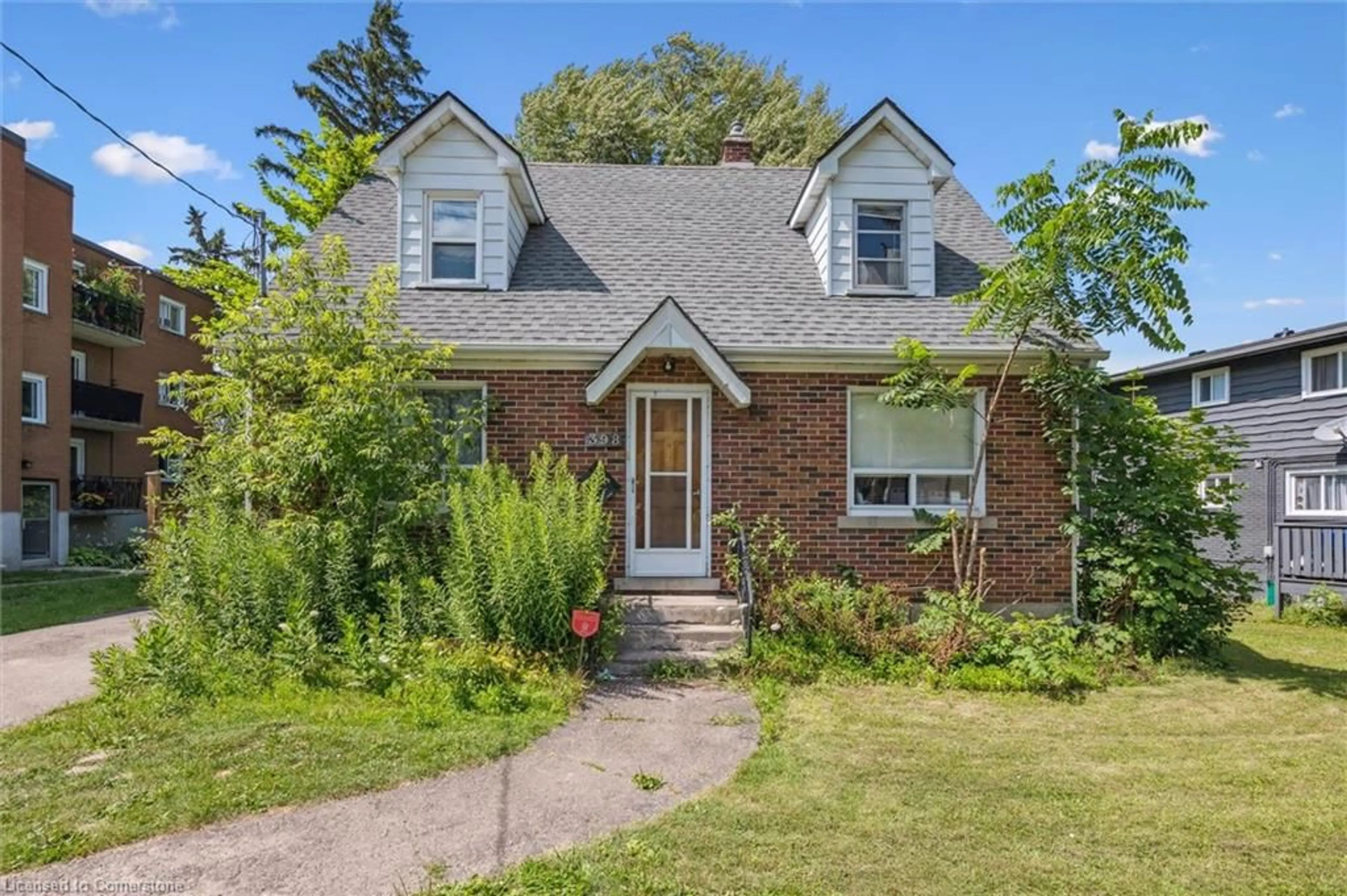 Home with brick exterior material, street for 392-398 Erb St, Waterloo Ontario N2L 1W6