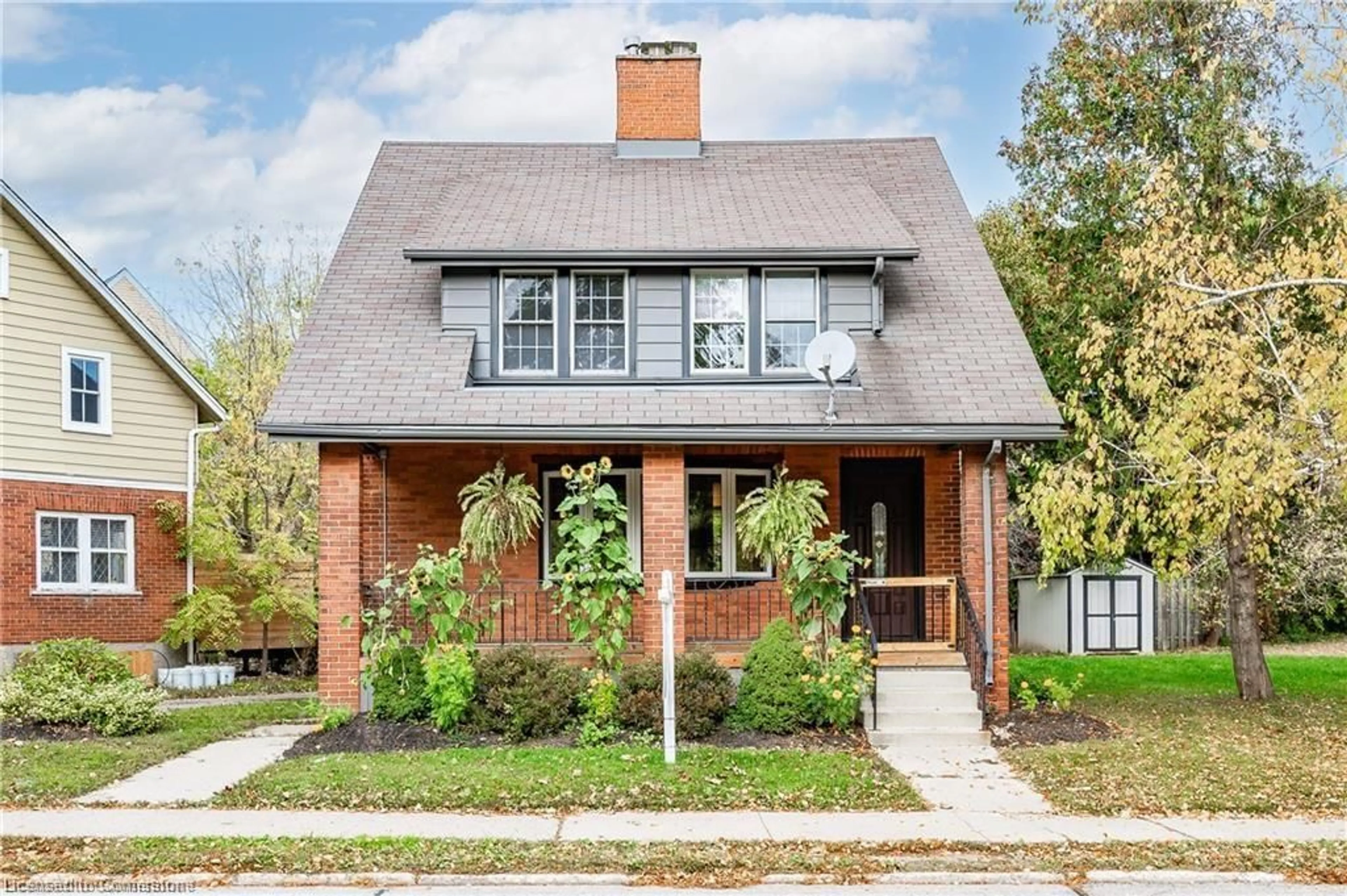 Home with brick exterior material, street for 100 Jubilee Dr, Kitchener Ontario N2G 1M1