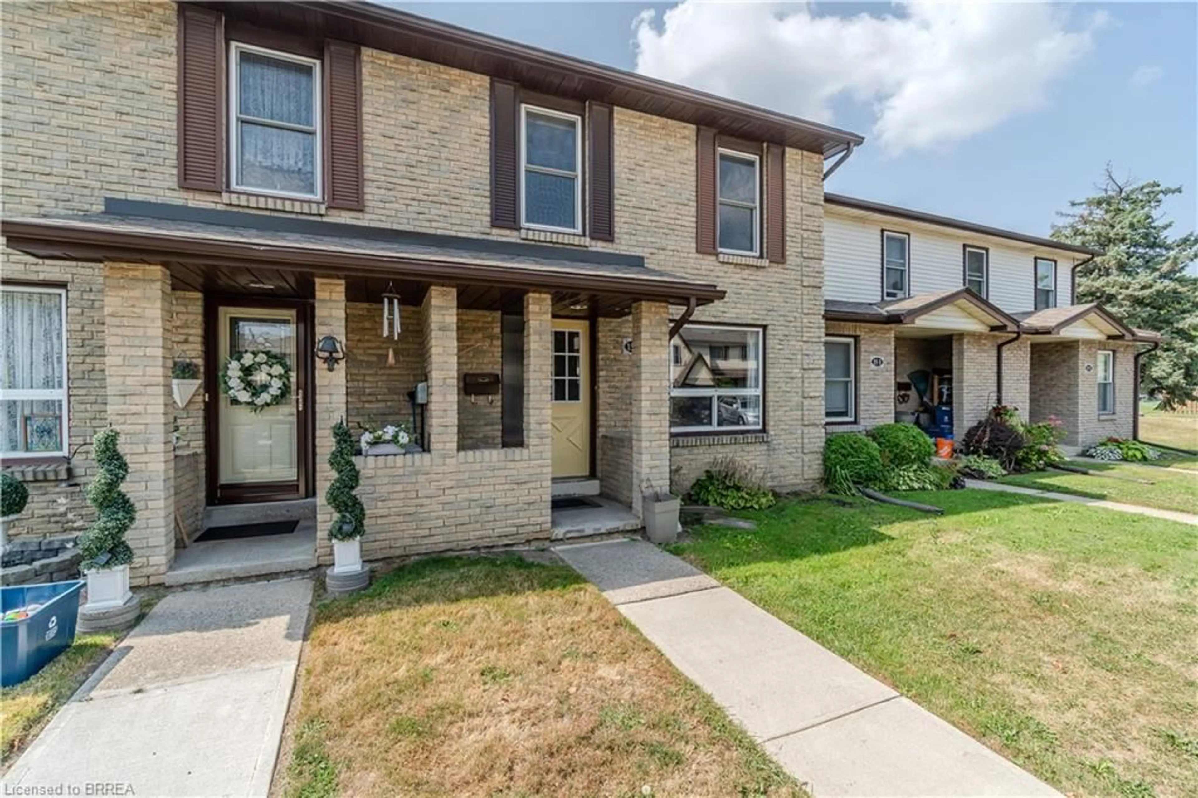 Home with brick exterior material, street for 15 Centennial Dr #D, Brantford Ontario N3R 6Y5