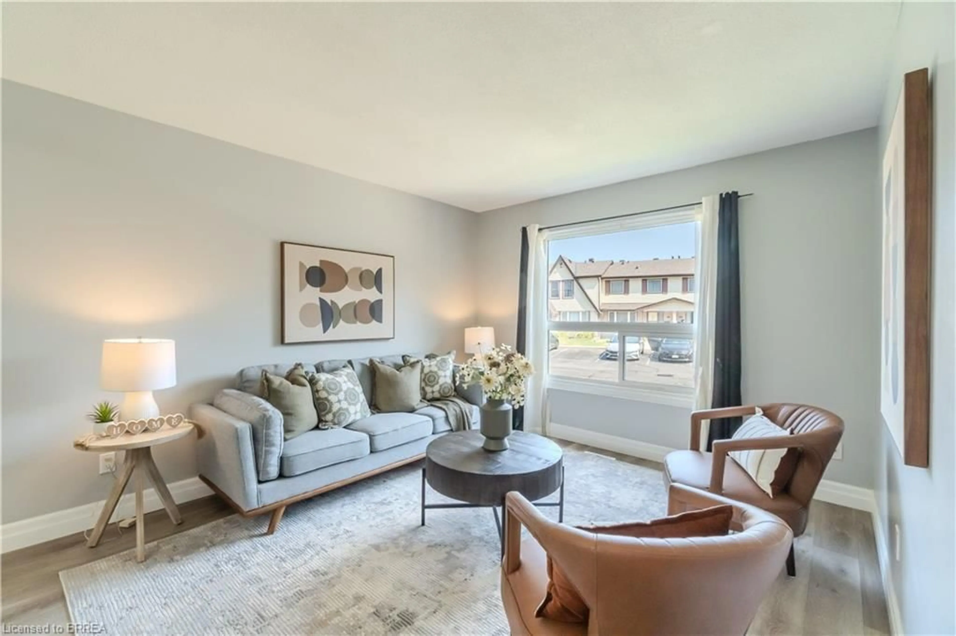 Living room with furniture, unknown for 15 Centennial Dr #D, Brantford Ontario N3R 6Y5