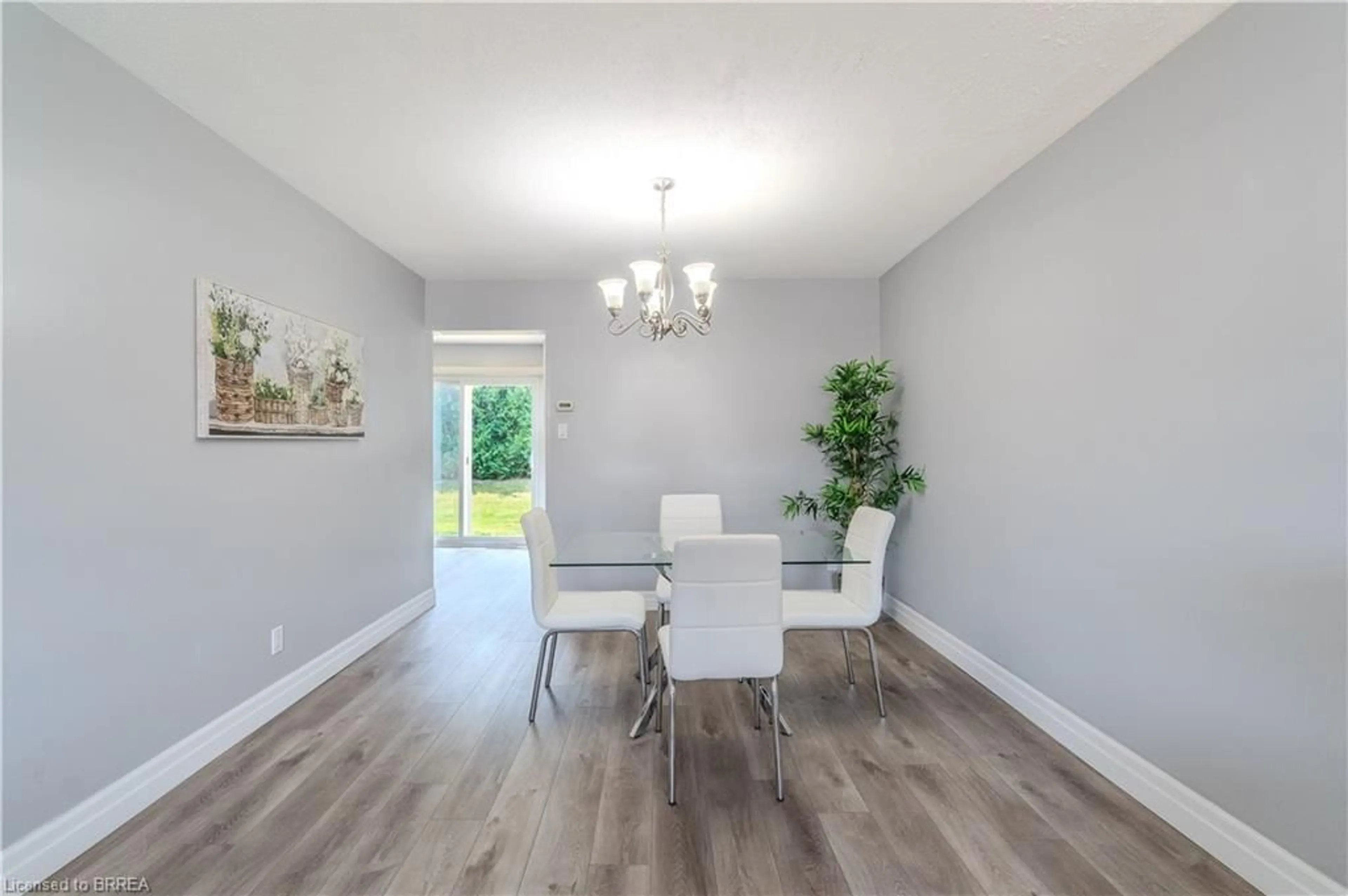 Dining room, wood/laminate floor for 15 Centennial Dr #D, Brantford Ontario N3R 6Y5