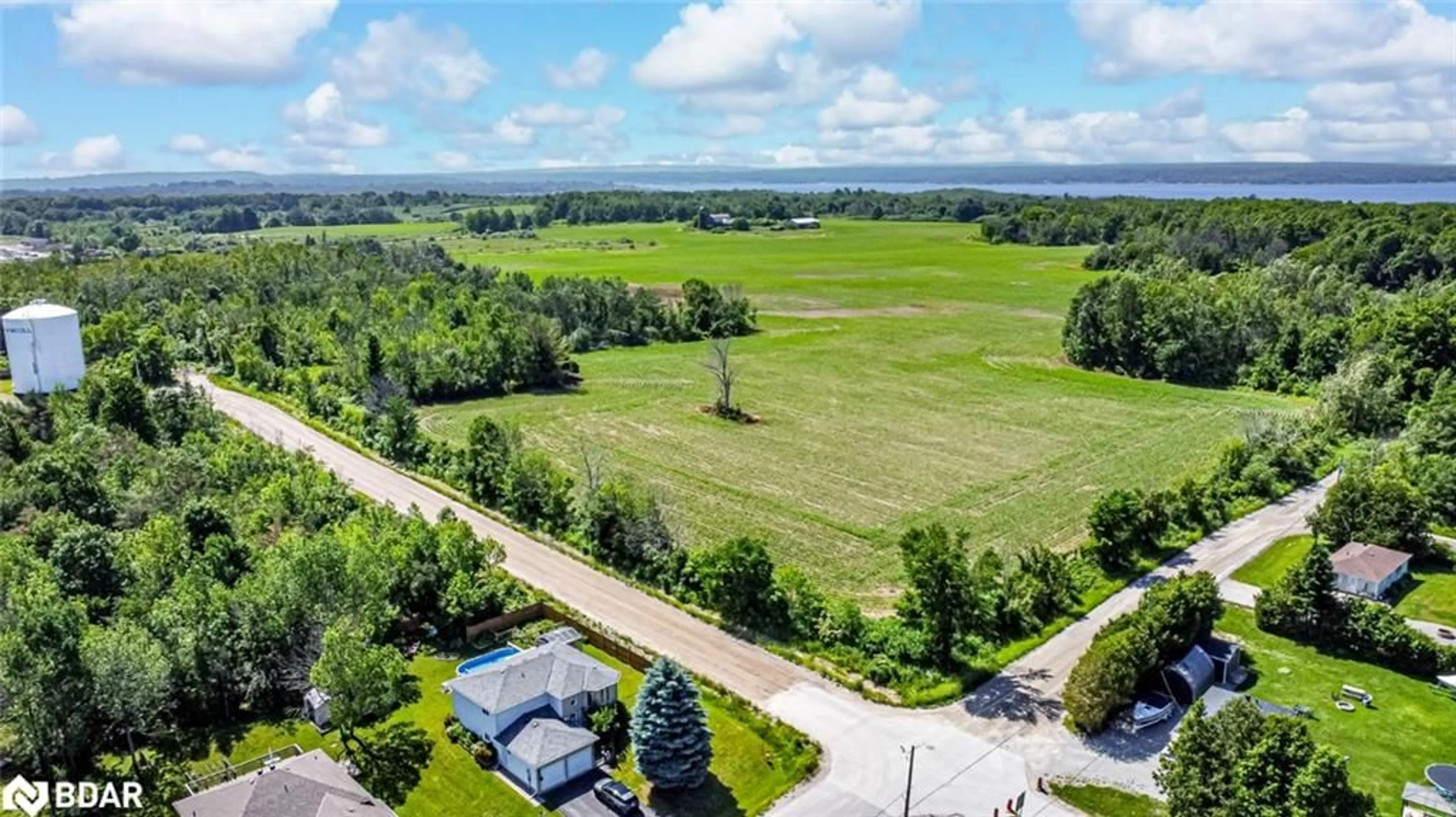A pic from outside/outdoor area/front of a property/back of a property/a pic from drone, water/lake/river/ocean view for 426 Seventh Avenue, Tay Ontario L0K 1R0