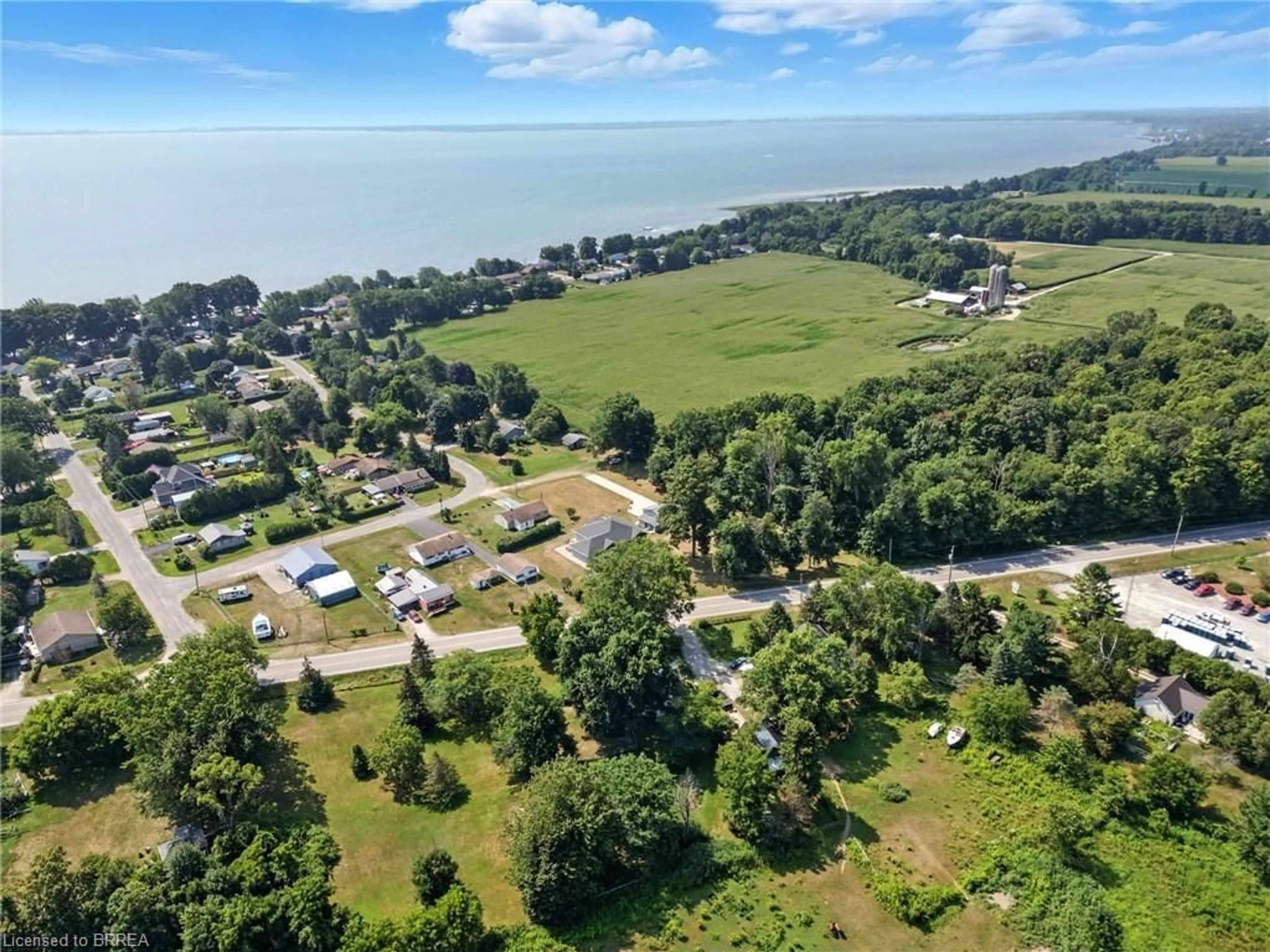 A pic from outside/outdoor area/front of a property/back of a property/a pic from drone, water/lake/river/ocean view for 1026 Front Rd, St. Williams Ontario N0E 1P0