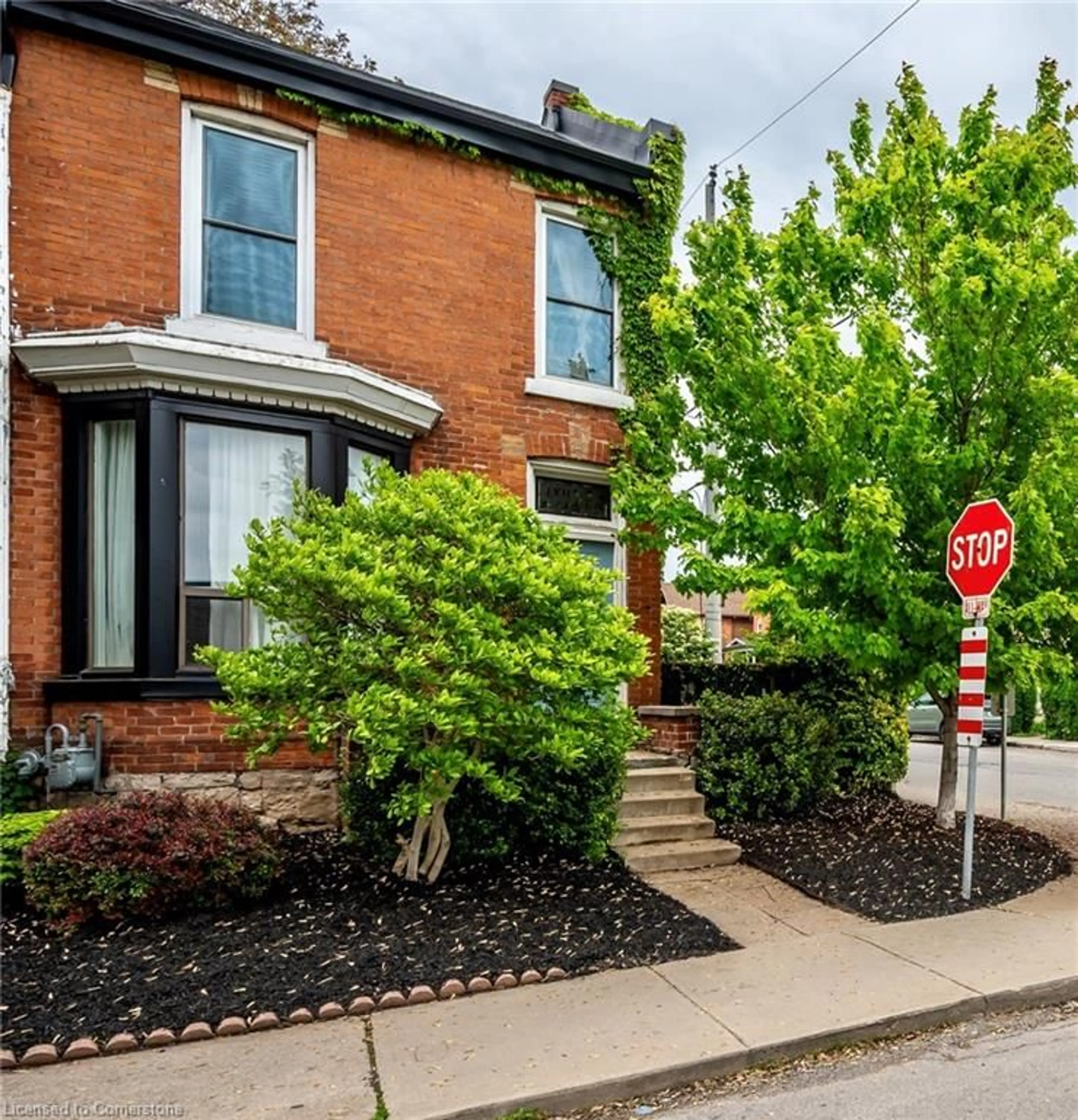 Home with brick exterior material, street for 29 Emerald St, Hamilton Ontario L8L 5J9