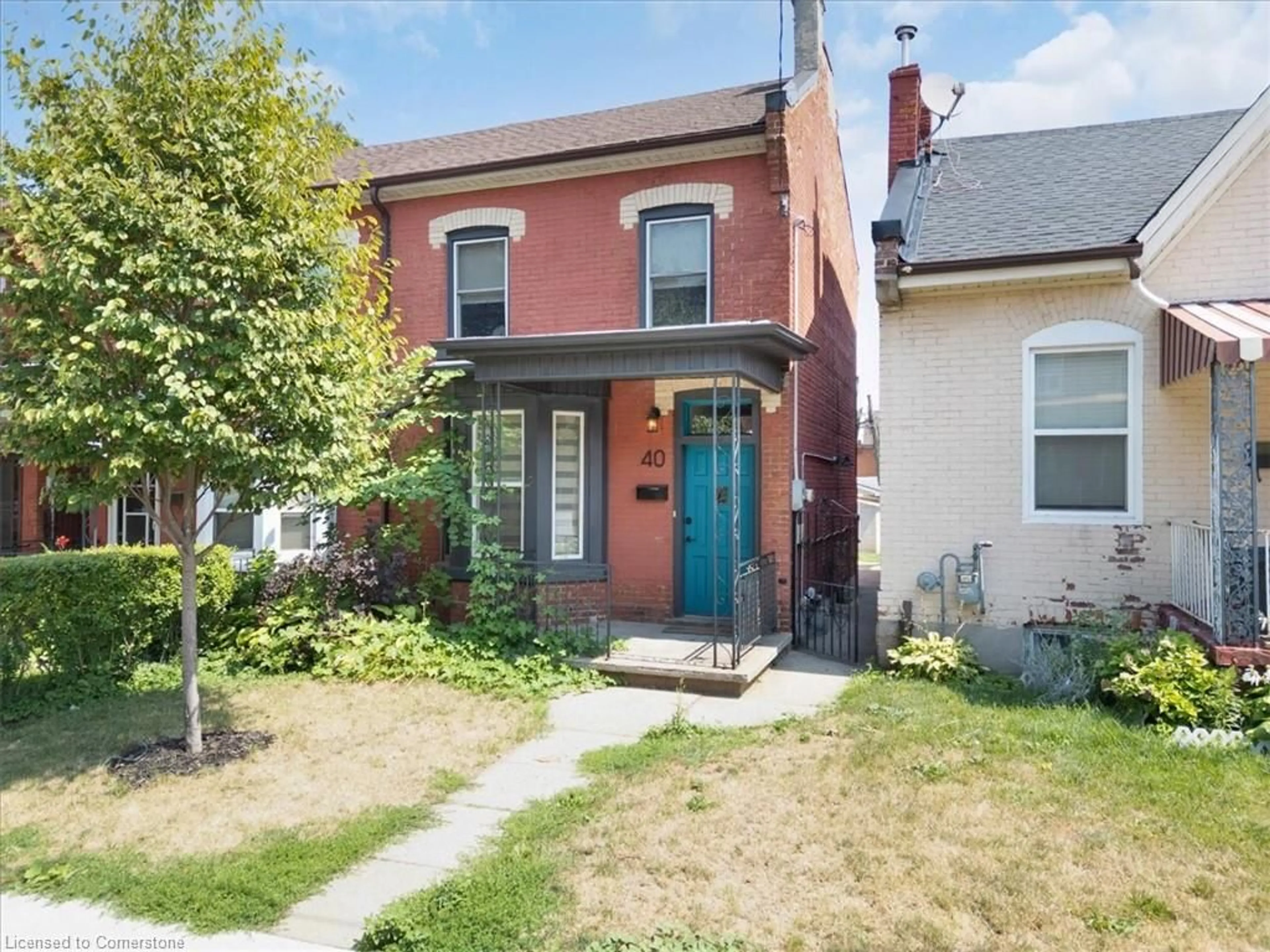Home with brick exterior material, street for 40 Emerald St, Hamilton Ontario L8L 5K3