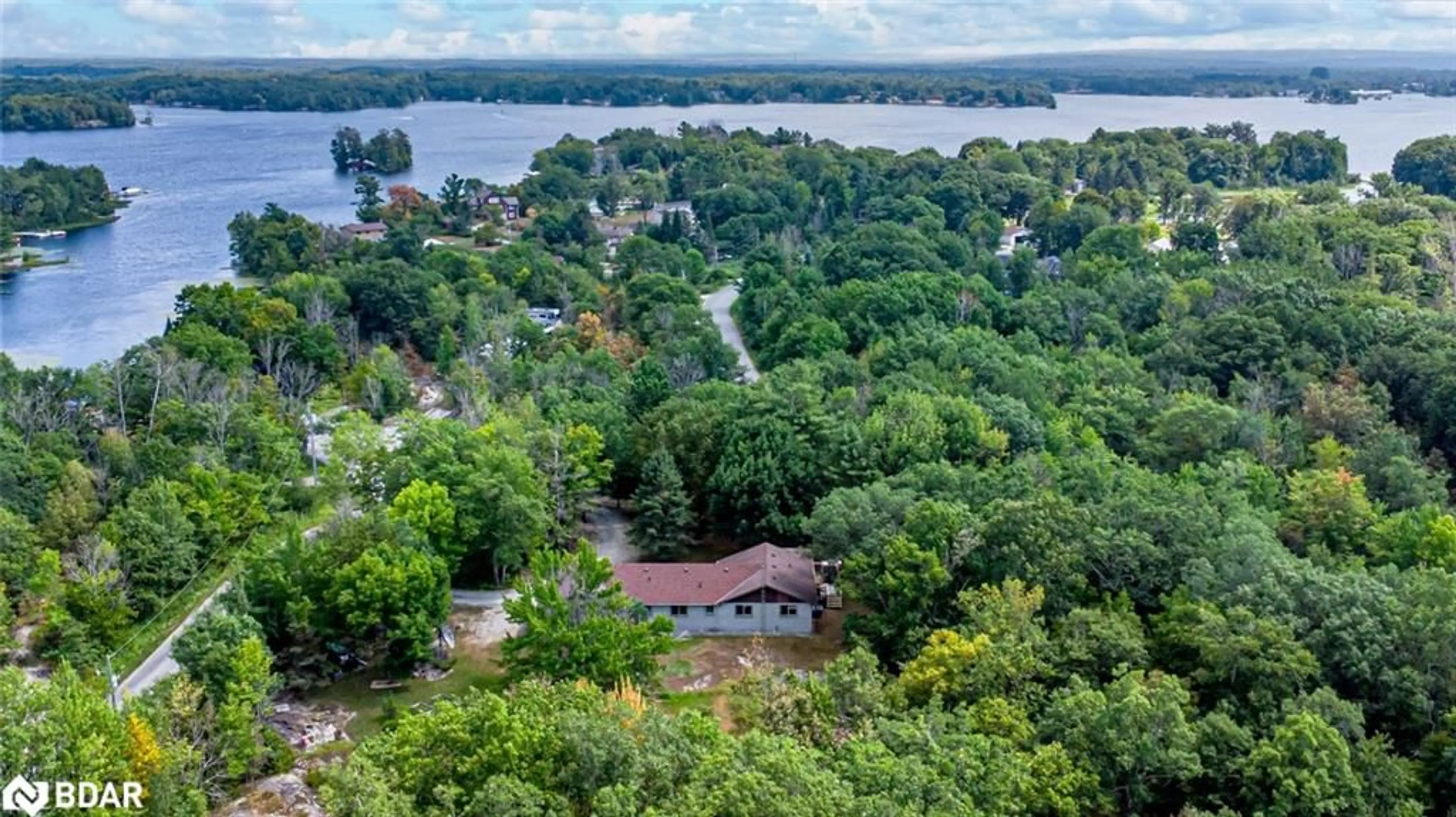 A pic from outside/outdoor area/front of a property/back of a property/a pic from drone, water/lake/river/ocean view for 87 Corrievale Rd, Port Severn Ontario L0K 1S0