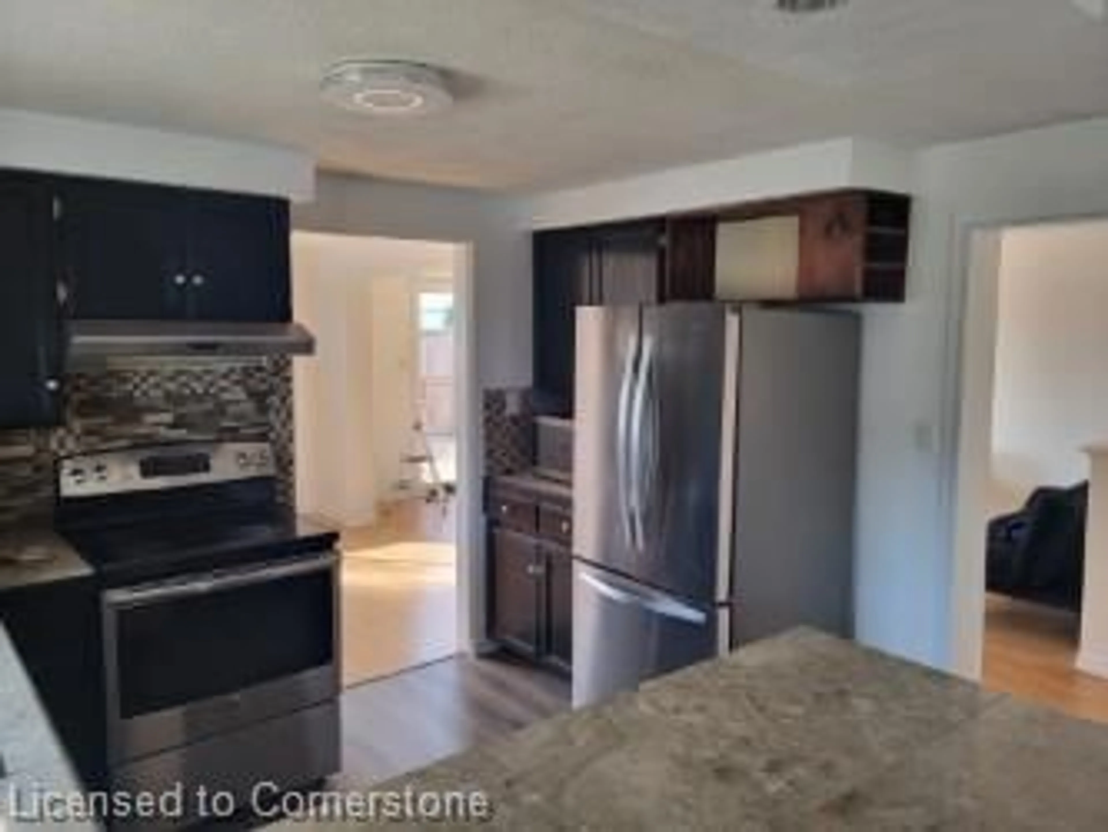 Open concept kitchen, ceramic/tile floor for 539 Briarwood Ave, Listowel Ontario N4W 3P9
