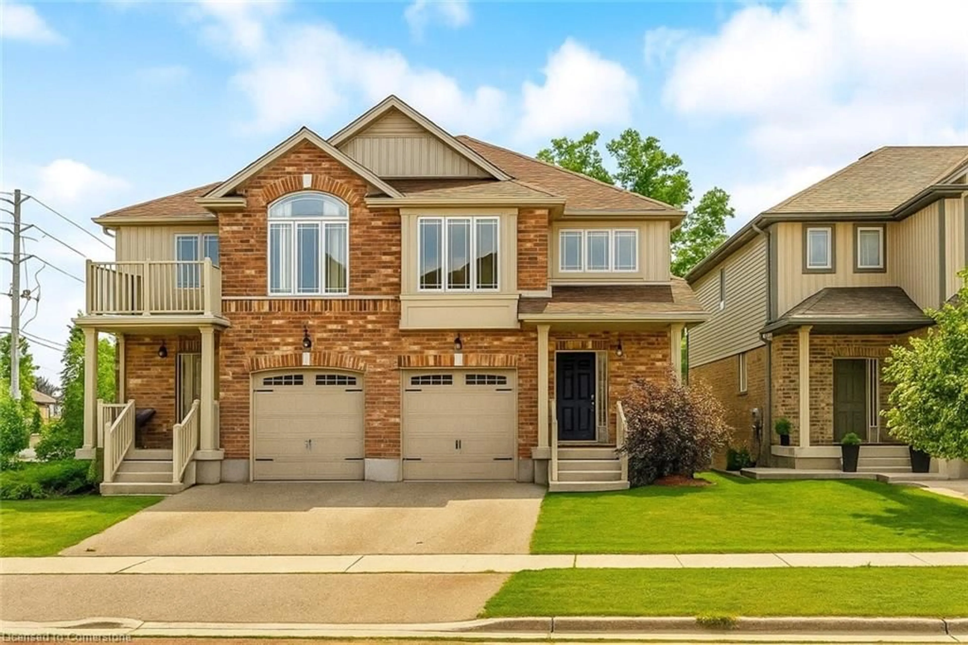 Home with brick exterior material, street for 448 Starwood Dr, Guelph Ontario N1E 0L6