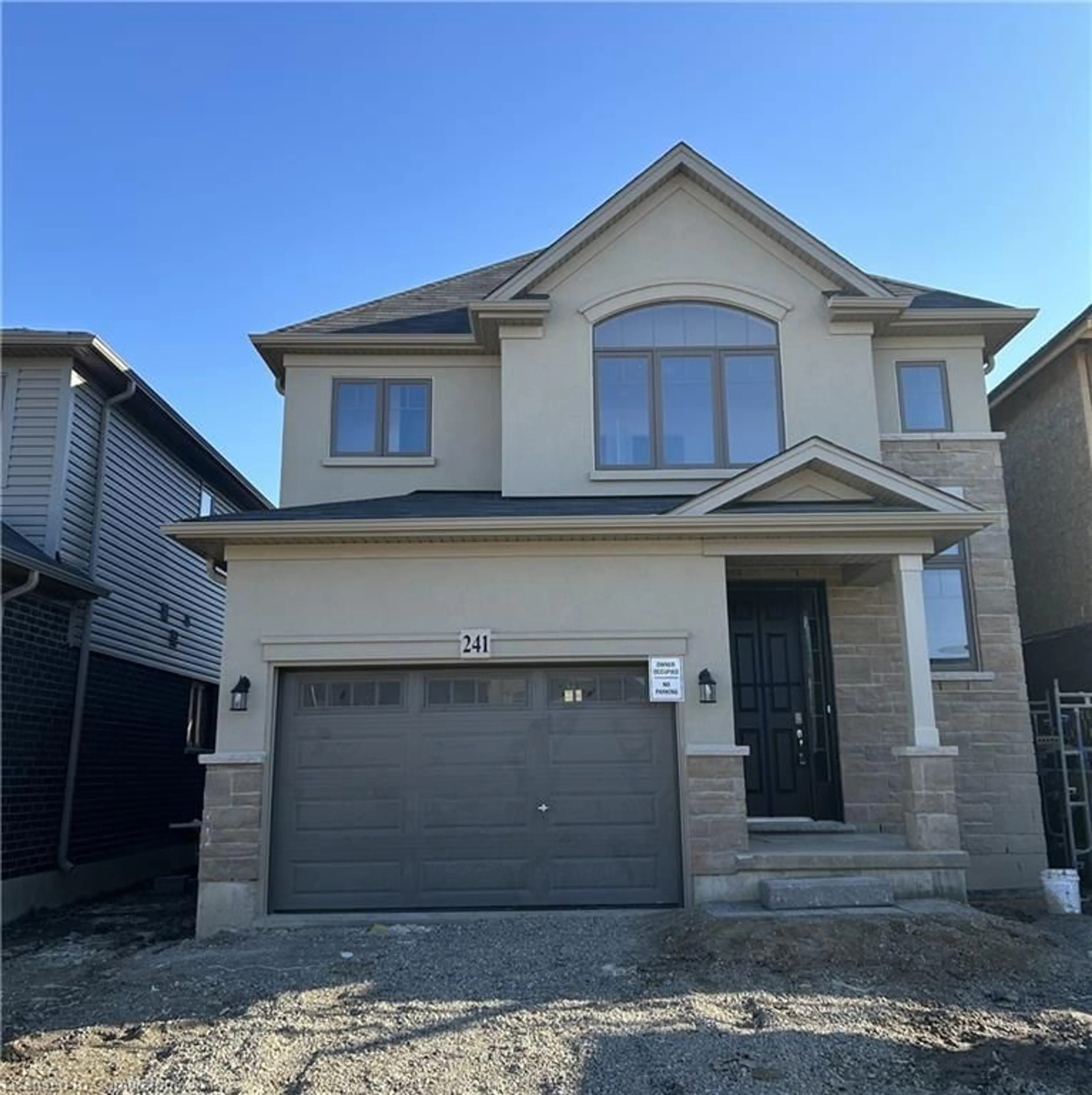 Home with brick exterior material, street for 241 Longboat Run, Brantford Ontario N3T 5L5
