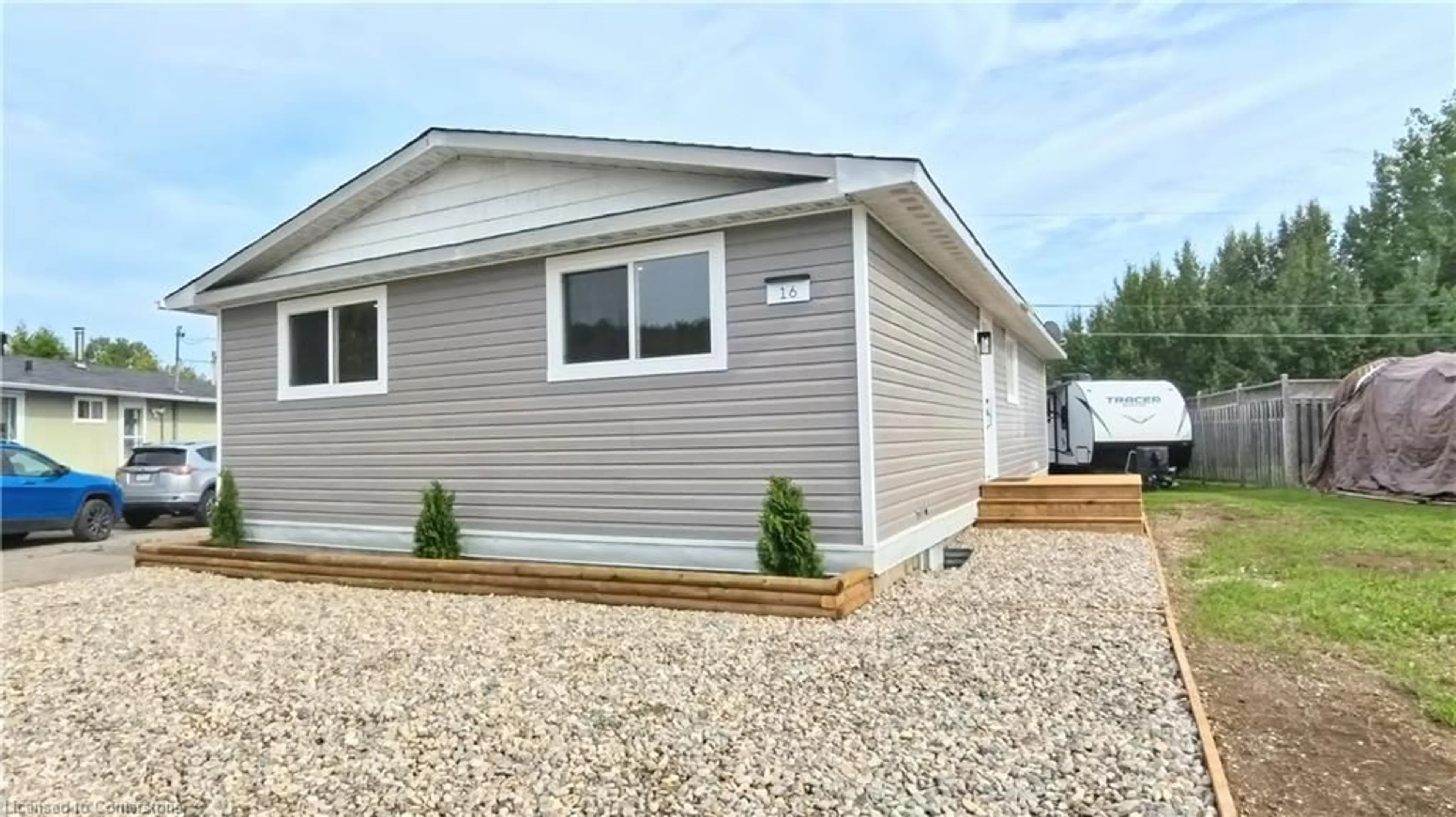 Home with vinyl exterior material, street for 16 Robin Ave, Manitouwadge Ontario P0T 2C0