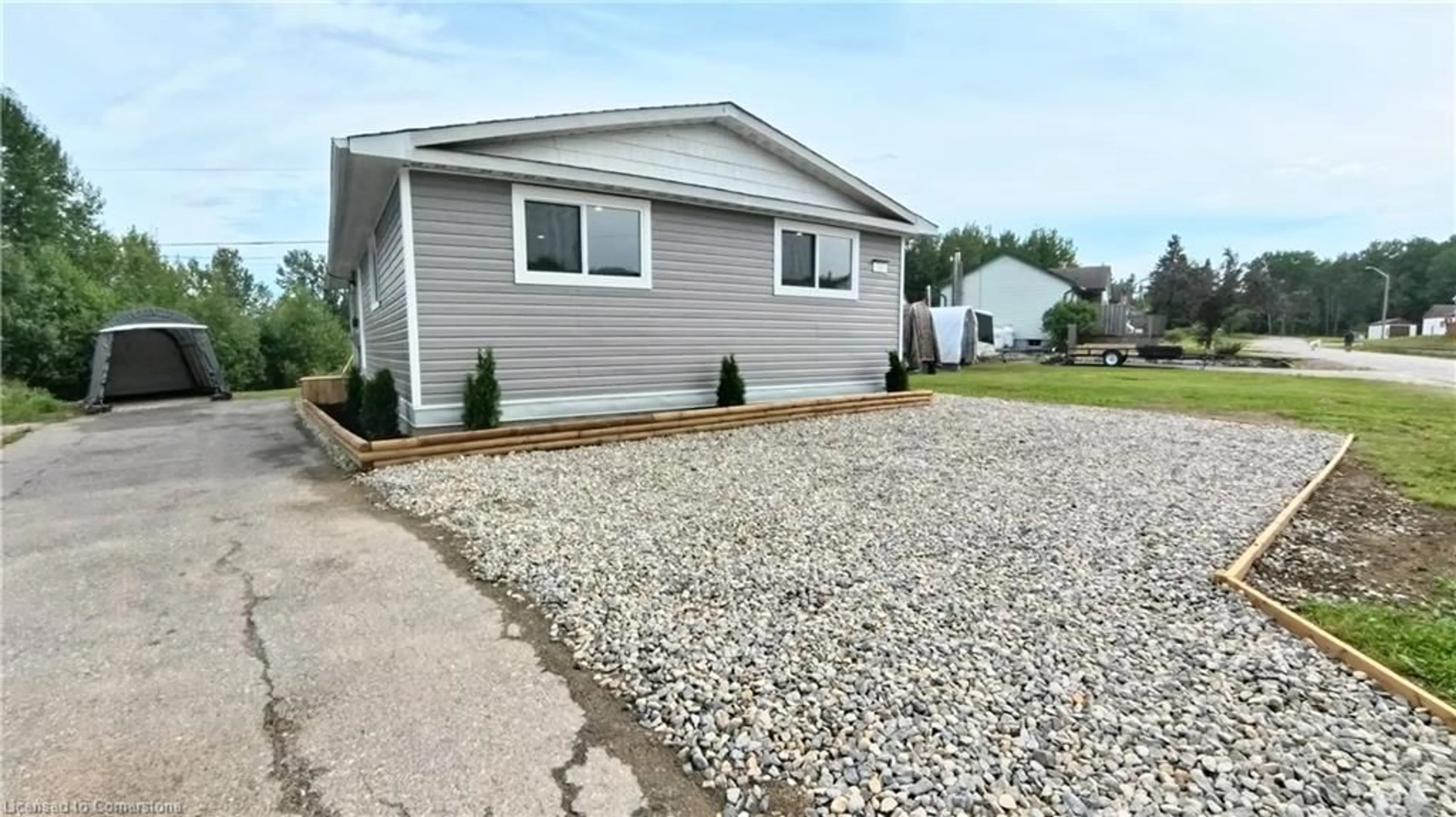 Home with vinyl exterior material, street for 16 Robin Ave, Manitouwadge Ontario P0T 2C0