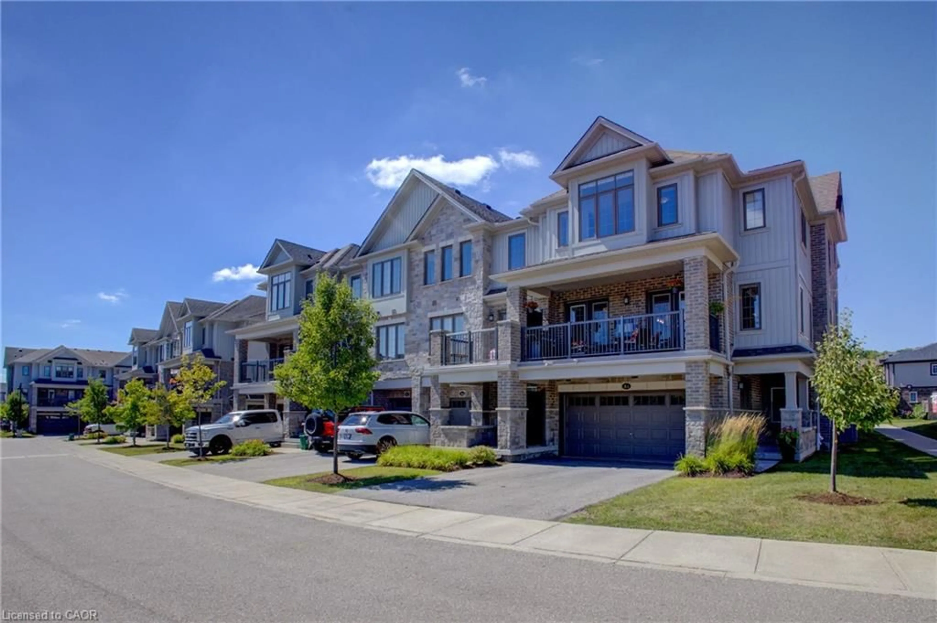 A pic from outside/outdoor area/front of a property/back of a property/a pic from drone, street for 115 South Creek Dr #4A, Kitchener Ontario N2P 0H2